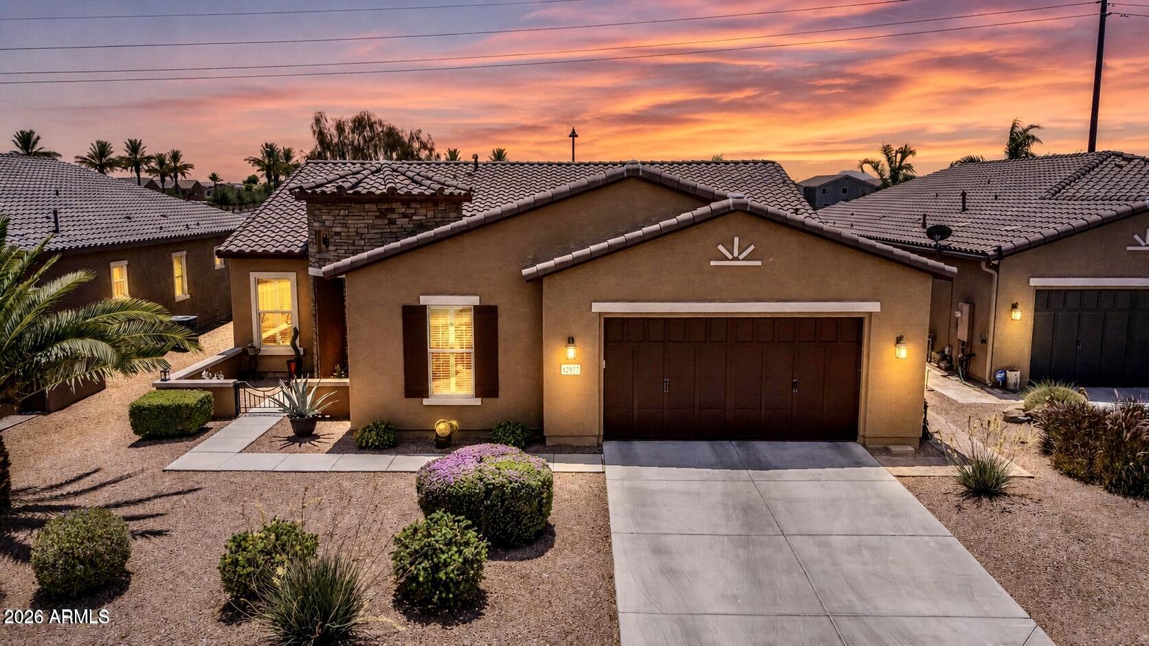 Beautiful Home built in 2016, 2 Bed / 2.5 Bath / Den, Energy-Efficient home featuring Popular FRANKLIN floor plan w/ North/South exposure and NO neighbors behind!  2026 WATER HEATER. Enter and you are greeted w/ the TRAY CEILING, wide hallway and specious Den to the left. The kitchen showcases Cherry Raised-Panel Cabinets, Moon White granite countertops, and a large island w/ Granite Counters.  Perfect for cooking and gathering. Separate Dining Area with Large Slider leading to well designed Backyard Retreat. Spacious owner's suite is split from guest bedroom, overlooks backyard and includes a large walk-in shower, double sinks w/ make-up vanity, and an oversized walk-in closet. The guest bedroom features its own en-suite full bath and walk-in closet.  Fully fenced lot. You will this home.