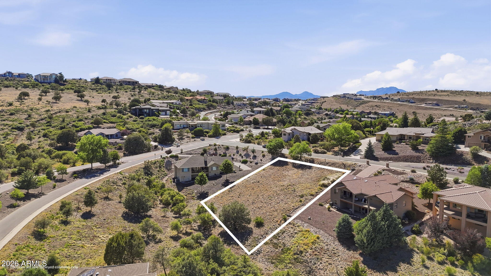 Exceptional view lot in the highly desirable Yavapai Hills community! This 0.53-acre homesite offers a gentle, build-friendly slope with panoramic mountain and valley views, providing the perfect setting for your custom dream home. Surrounded by quality site-built residences, the property combines privacy, scenery, and convenience in one of Prescott's most sought-after neighborhoods. Enjoy easy access to shopping, dining, golf courses, hiking and biking trails, lakes, and Community amenities include a clubhouse, swimming pool, spa, tennis and pickleball courts, horseshoe pits, and a variety of social activities.