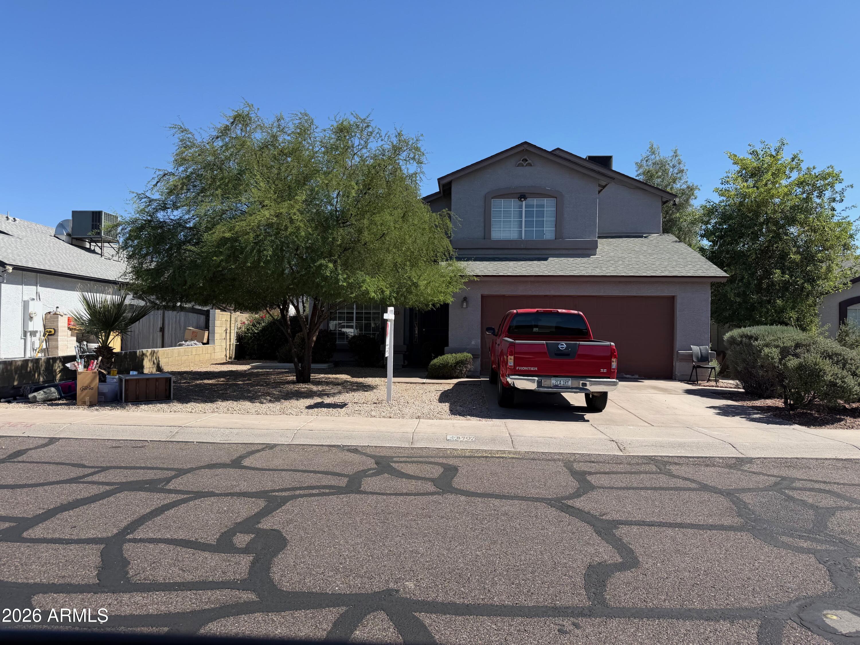 Spacious 5-bedroom, 3-bath Phoenix home with 2,250 sq. ft. of living space and a 2-car garage. This property offers a great opportunity for a buyer looking for space, value, and the ability to add their own personal touch. The home does need TLC, but it has strong upside with paid-off solar panels and a newer roof, helping reduce two major ownership concerns. Inside, you'll find a functional floor plan with tile/carpet flooring, a fireplace, and room to reimagine the space. Sitting on a 7,000 sq. ft. lot in the Maryvale area, this home is ideal for an owner-occupant, investor, or buyer willing to put in work and build equity. Conveniently located near schools, shopping, and West Phoenix amenities.