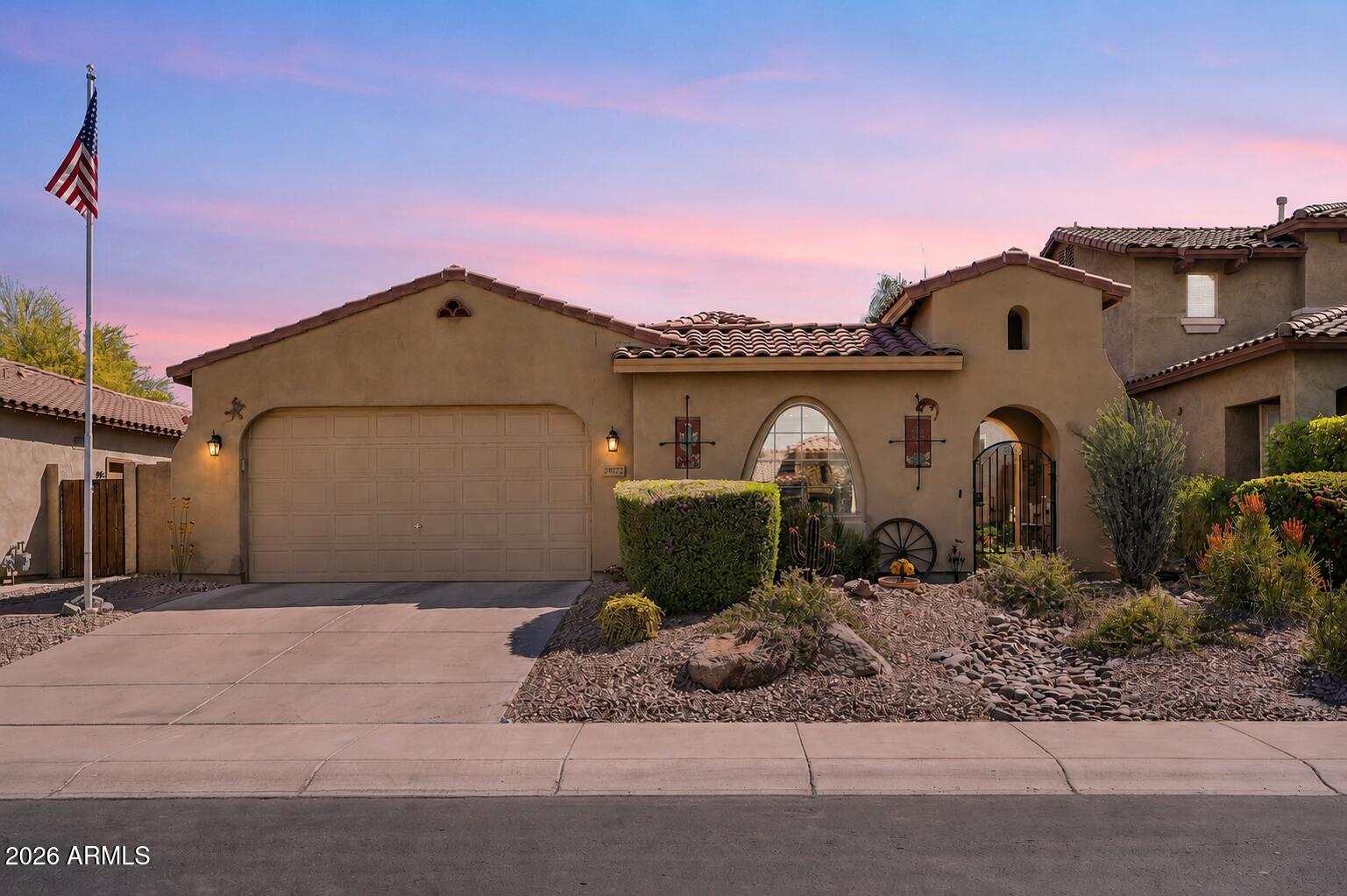 Resort-Style Backyard Oasis in Sonoran Mountain Ranch
Experience the perfect blend of comfort, style, and outdoor living in this beautifully maintained single-level Shea home in the desirable Sonoran Mountain Ranch. Featuring 4 bedrooms, 2 bathrooms, and 2,111 square feet, this home is designed for both everyday living and unforgettable entertaining. The true centerpiece is the spectacular resort-inspired backyard. Step outside to your own private retreat, complete with a sparkling pool featuring elegant water features, an extended paver patio, covered outdoor living spaces, and a charming cantina-style atmosphere that feels like a luxury getaway. Towering palms, lush landscaping, a pergola, a built-in BBQ area with refrigerator, and multiple gathering spaces create the perfect setting for relaxing or hosting family and friends.

Inside, the open-concept floor plan offers warm wood-look flooring, spacious living and dining areas, and a beautifully appointed kitchen with granite countertops, rich cabinetry, pendant lighting, under-cabinet lighting, and a large island with breakfast bar seating. The split primary suite provides a peaceful escape with a custom walk-in closet, barn door entry, raised dual-sink vanity, and an oversized custom tile shower.

Additional highlights include a welcoming front courtyard, an extended 2-car garage, newer appliances, updated lighting, a water softener, and solar added in 2025 for enhanced energy efficiency.

Located in the sought-after Sonoran Mountain Ranch community near parks, trails, shopping, dining, and top-rated schools, this exceptional property offers the Arizona lifestyle buyers dream about.
