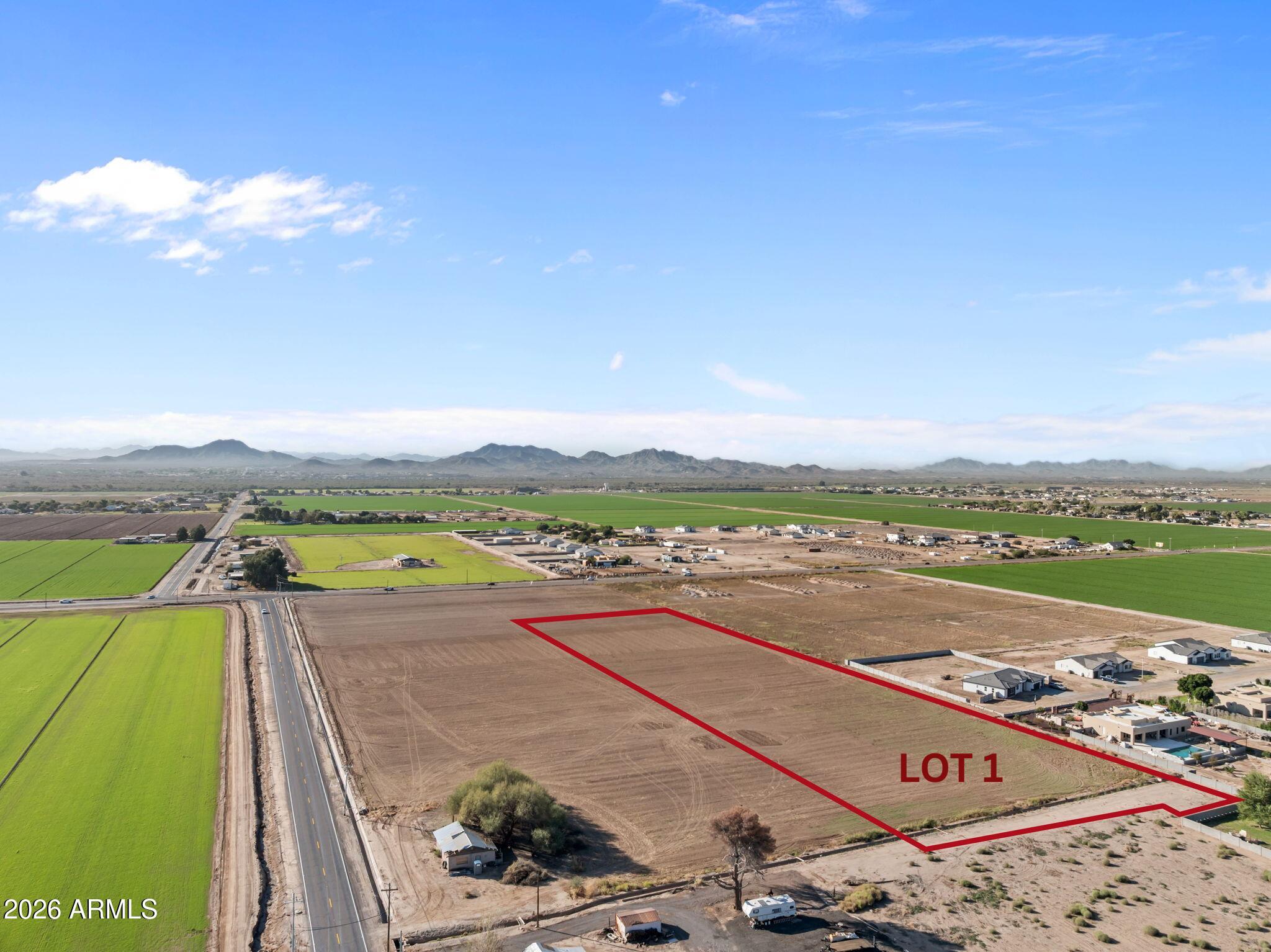 Incredible opportunity in Buckeye! These 3 acres of irrigated land are ideal for small business owners needing more space, custom home builders, or horse lovers. Irrigated land is becoming increasingly rare in this area. This property includes grandfathered irrigation rights, access from MC85, and a prime location close to the community of Verrado, Costco, I-10, and Loop 303. Enjoy country living with city convenience. A new survey has been
completed and will be recorded at close of escrow. Perfect spot to build or invest in the fast-growing Buckeye area!
