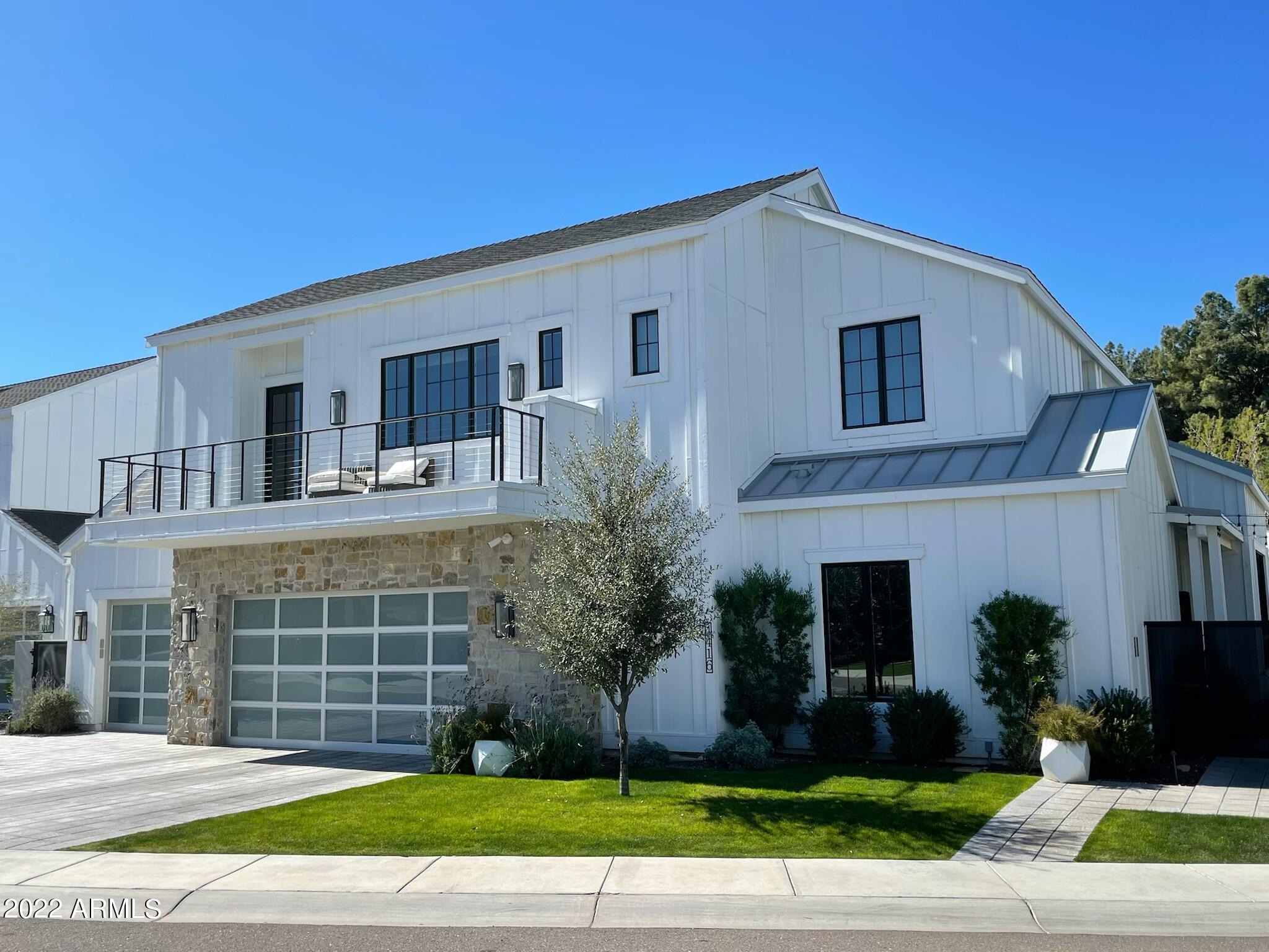 BACK FROM SOLD 3/10/22 - Spectacular newer build (2019) modern farmhouse style in intimate gated community located in the heart and soul of 85018.  Exquisite Interiors by Est Est with every possible upgrade.  Primary suite on the main level with direct access to the yard and lap pool.  Control 4 full home automation for everything from lighting, custom window shades to pool and whole home generator.  Just move in and enjoy this property as your main residence or seasonal lock and leave.  Even enjoy views of Camelback Mountain from the upstairs family room and balcony.  Please review the extensive list of upgrades, floor plan and the Matterport in the documents tab.