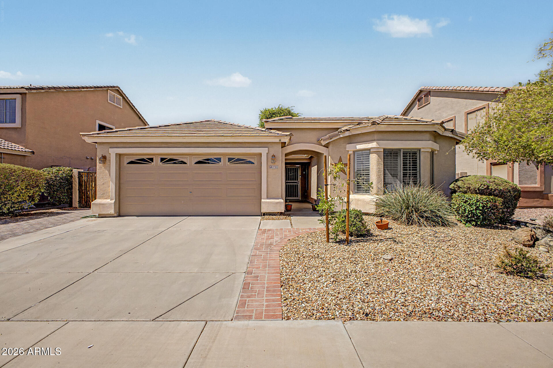 Become the proud owner of this lovely home in Cottonflower! You're greeted by a 2-car garage, stylish pavers, and a practical RV gate. Discover an inviting open layout with vaulted ceilings, a soothing palette, and durable tile flooring. You'll also find a formal dining room for hosting special dinner get-togethers. The eat-in kitchen comes with ample wood cabinetry with crown moulding, recessed lighting, stainless steel appliances, a pantry, and an island with a breakfast bar. The primary bedroom showcases soft carpeting, classic plantation shutters, a private bathroom with dual sinks, and a walk-in closet. Enjoy peaceful moments in the backyard, complete with a covered patio, pristine artificial turf, and a refreshing pool for cooling down on hot days. Make this gem yours today!