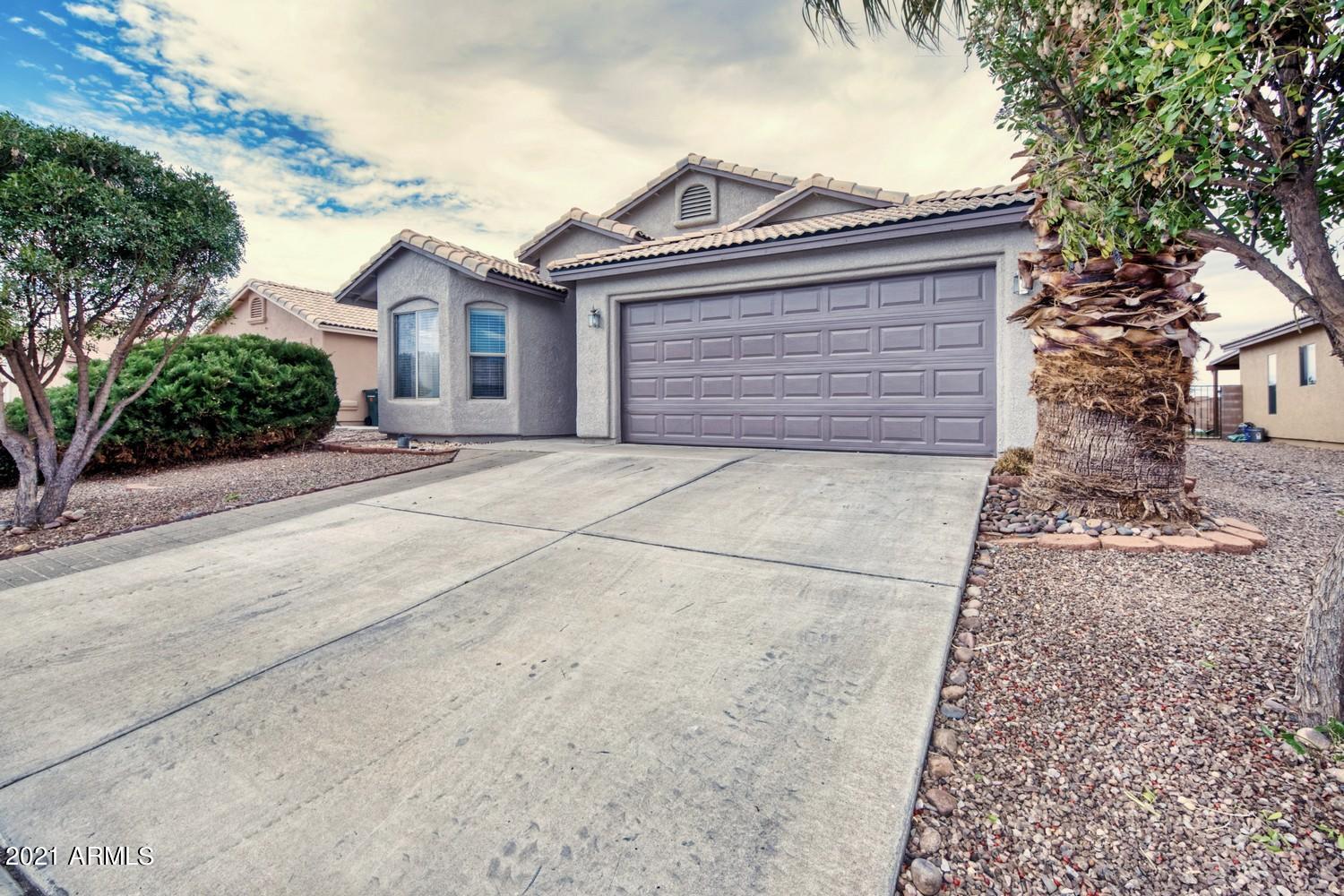 Great family home in Chaparral Village North!  Freshly painted exterior makes this 3 bedroom 2 bath home stand out!  Beautiful ceramic tile in all the living areas, and carpet in the bedrooms for easy cleaning.  This home shows like new!  Easy maintenance landscaping both front and back let's you really enjoy your spare time.  Community park for the kids right around the corner.  This home is priced to sell quickly.  Don't miss your chance to call it YOURS