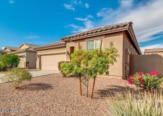 Well-maintained and loaded with upgrades! This rare 4-bed, 3-bath single-story home features tile in all the right places, maple cabinets, granite countertops, 9' ceilings, and a HUGE primary bath and closet. The spacious kitchen with oversized island is perfect for gathering, and the refrigerator is included! Enjoy an open, inviting floor plan, low-maintenance turf backyard, plus included water softener and reverse osmosis systems. Located in a community with a golf course and 4 pools for resort-style living. Homes like this go fast--Welcome Home!
