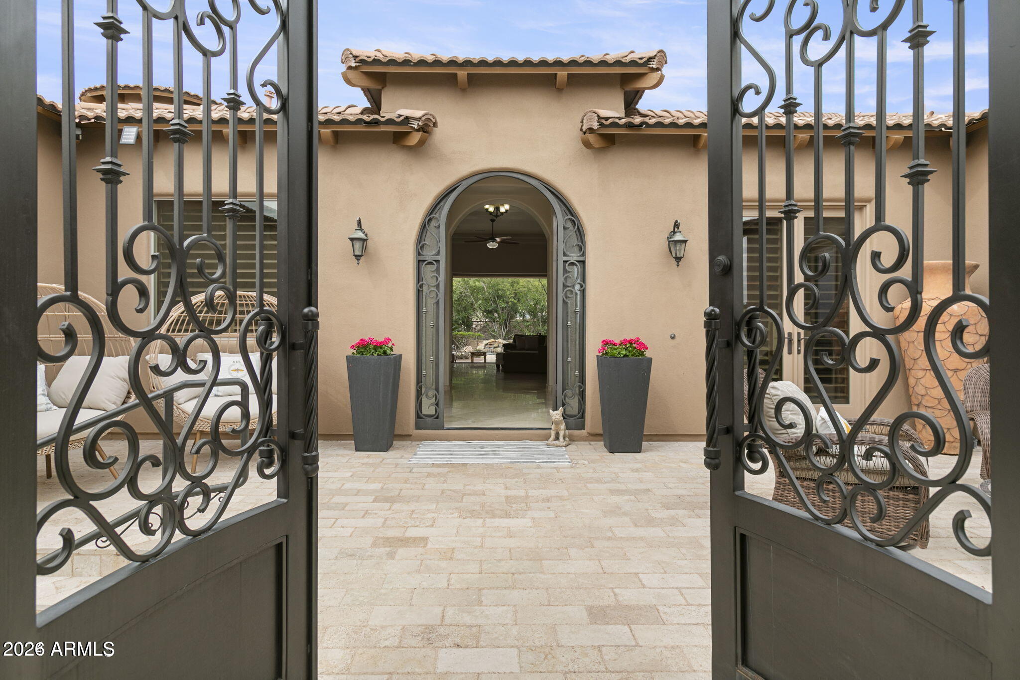 IS THERE A BETTER DEAL IN ALL OF SCOTTSDALE?? Hidden in the Hills of Scottsdale, this custom estate offers so many amenities. 3 bedrooms in the main house, 2 casitas with private entrances.  We have upgraded the home with engineered hardwood in the bedrooms. Dedicated conditioned wine room, an elevator to view deck, pool, spa, waterfall and baja shelf. Power sliding glass wall. RARE hillside property with a yard!  HIDDEN walk-in pantry. Second living room opens to front patio, perfect for hosting.  Stellar mountain views in the backyard with built in BBQ grill and smoker. Furniture conveys with the home. Put us on your list & come see us today, as this one may go quick! Priced to sell!