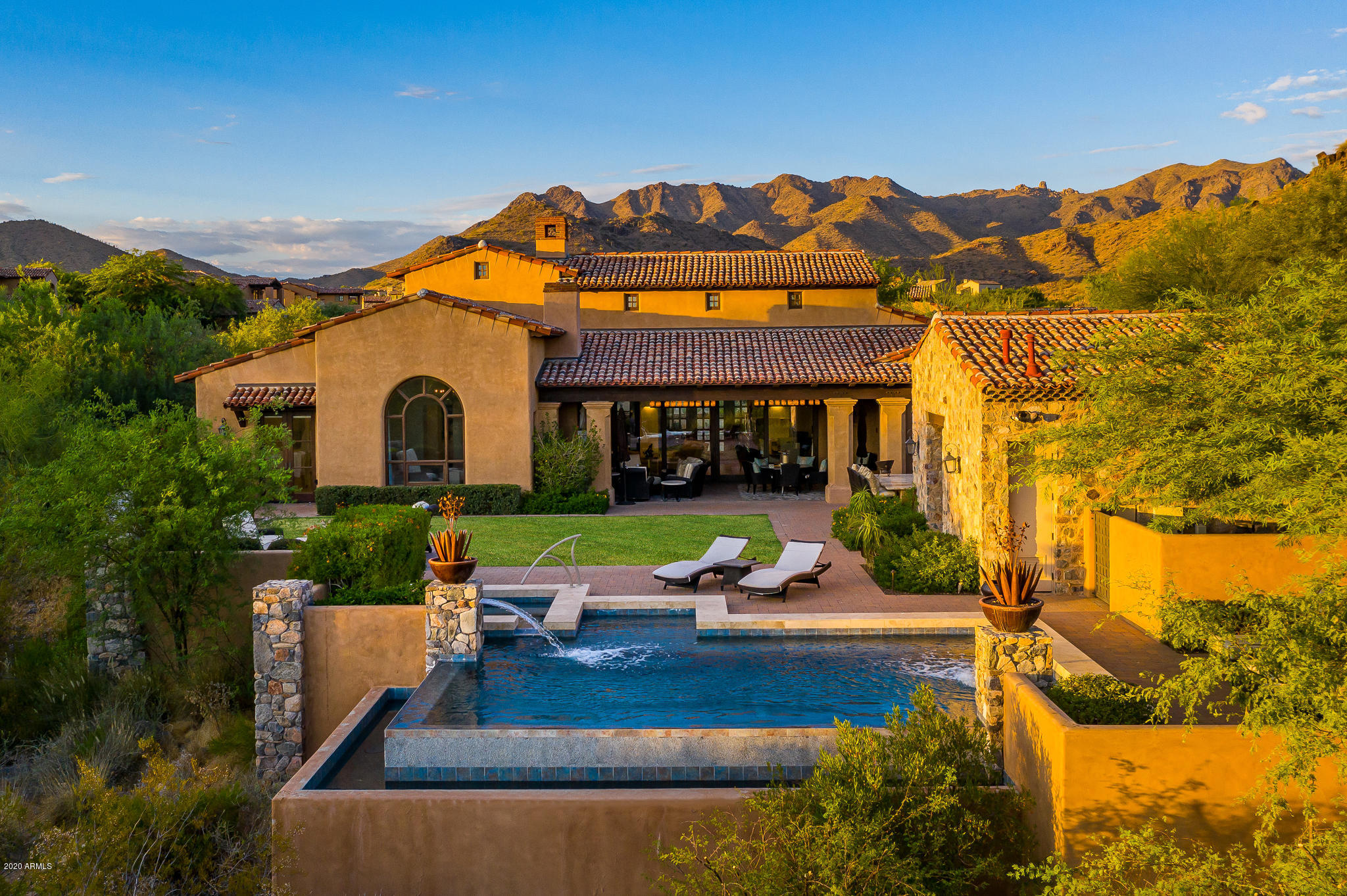 Enjoy mountains, captivating sunsets and city lights from this gorgeous single level home, located within the prestigious Silverleaf community.  The owner's attention to detail and exquisite finishes throughout the home has it poised for immediate move-in. The chef's kitchen along with discreet prep area, large island and open floor plan makes this the perfect home for entertaining. The great room has large pocketing doors leading out to an inviting covered patio perfect for enjoying the desert lifestyle.  Owner's retreat is spacious with gorgeous arched window to admire the view, beautifully finished bath, with steam shower, his and hers vanities, make-up area and walk-in closet. Generous guest suite includes dual sinks, soaking tub and shower. Office has French doors leading to the front courtyard and its' own half bath. Media room is perfect for snuggling up and watching your favorite movies. Your guests can enjoy their own space in the detached guest casita with kitchenette located next to negative edge pool and spa.  The cozy firepit offers a great place to unwind at the end of the day.  Control 4 system operates all the aspects of the home. This home will not last long, call today for your own private tour.