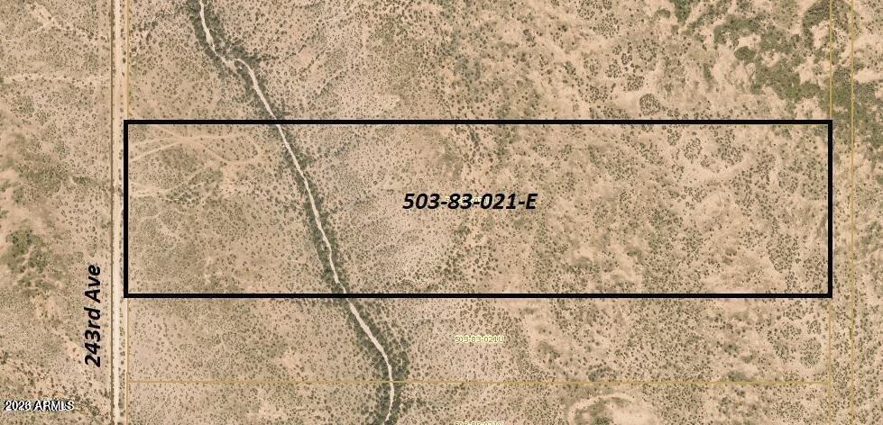 37 acre lot with beautiful mountain views and amazing sunsets. This property has frontage on 243rd Ave. This is prime real estate located in growing Surprise. . Lot is nearly 1/2 mile wide, with tons of flat, accessible land for multiple homes. Get to the property from Sun Valley Pkwy or from Patton Rd. Shopping, freeway access and Lake Pleasant within miles