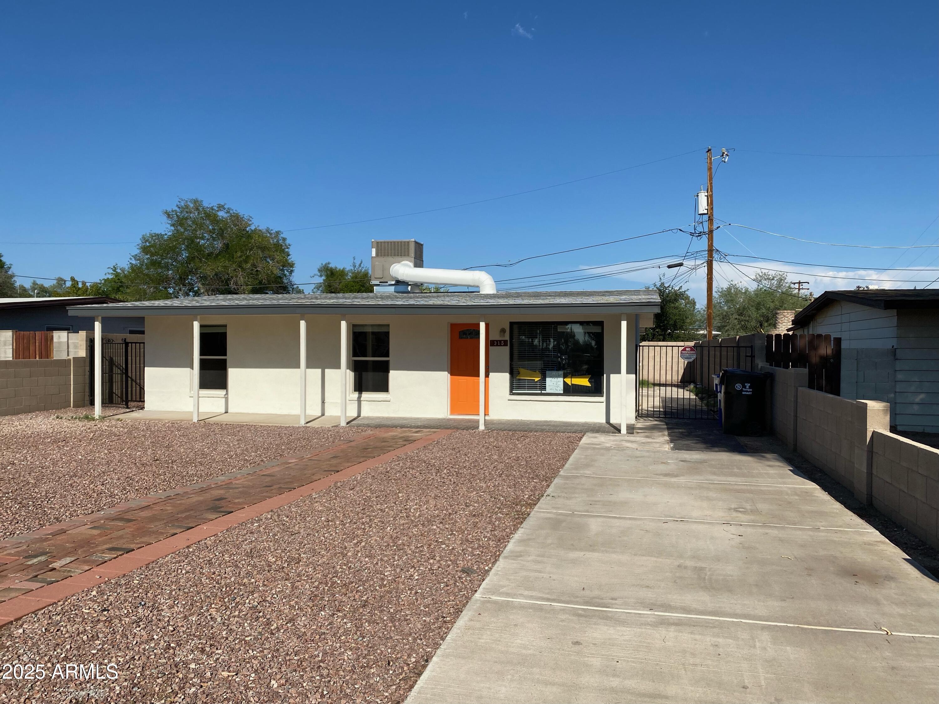 Do NOT disturb tenants, DRIVE-BY ONLY!  Rare opportunity to own a home in the heart of Tempe WITH A STUDIO CASITA - close to ASU!  Very charming, low maintenance & UPDATED!! This would make a great rental investment (currently rented for $2,500/mo) or live in the home and rent the casita for rental income; or use the casita as you like! 
AMAZING LOCATION: A short 2 min walk to the Blue Orbitz Bus (with connections to the Light Rail) and Valley Metro Bus pickups!   Less than a mile to the 202!  Just a 5 min drive to Sky Harbor Airport, 10 min drive to Downtown Phoenix and Old Town Scottsdale!  Only a 5 min walk to the Light Rail, Mill Ave restaurants, shopping and nightlife, Tempe Beach Park and the ASU campus! Large concrete rear patio and new synthetic grass yard - with lots of room for pets, play, entertaining and more.

New in 2023: fully remodeled kitchen and casita; all new interior doors, hardware, blinds, lighting, ceiling fans, interior and exterior painting; and newer roof and AC!

Open, bright and very well maintained. Vaulted ceilings, warm custom paint tones and attractive low maintenance tile flooring throughout.
Kitchen boasts gas cooking, all newer white shaker cabinets with quartz countertops, undermount sink, and ample cabinet and counter space.
Bedrooms are generously sized with ceiling fans in each, and closet organizers.  
Private indoor laundry. 
Fully enclosed front and rear yards with no fuss landscaping. 
No HOA.
This gem is a great combination of style and location - see it and make it yours - won't last long!!

More photos coming soon!