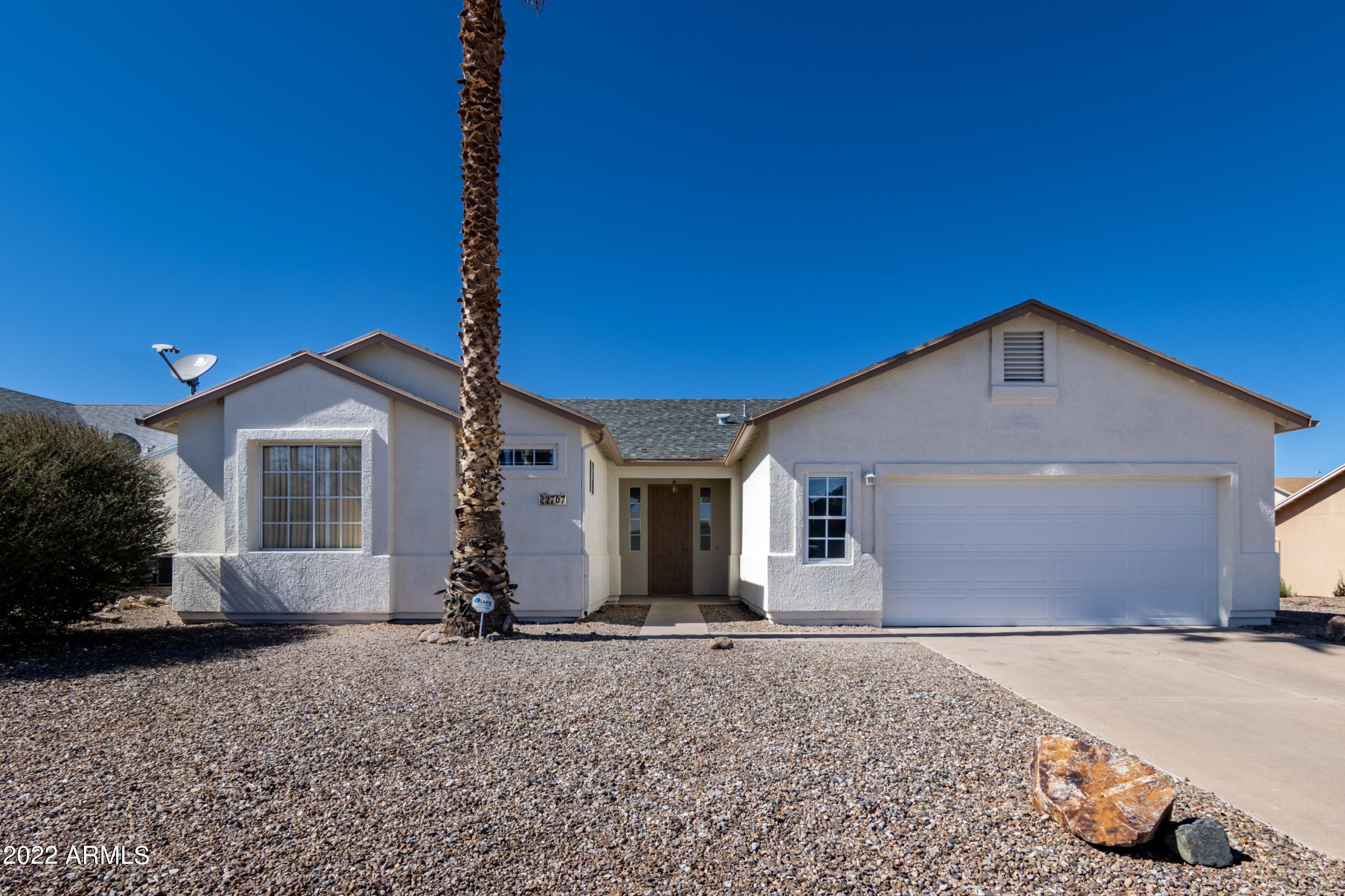 Move in ready home located in a desirable neighborhood very close to a desirable elementary school. This lovely 3 bed 2 bath home just received new two-tone exterior paint and a landscaped make over. Newer AC for those hot summer days. Inside you will find a large open floor plan concept with a large kitchen that overlooks the dining room and living room. There is large and wood look a like tile in all high traffic areas including the master bedroom.  Master bedroom is large with an oversized patio door leading to the backyard. Walk in closet and great master bathroom. Two very nice sized bedrooms on the other side of the home with another bathroom. This home will not last long so please call for a private showing.