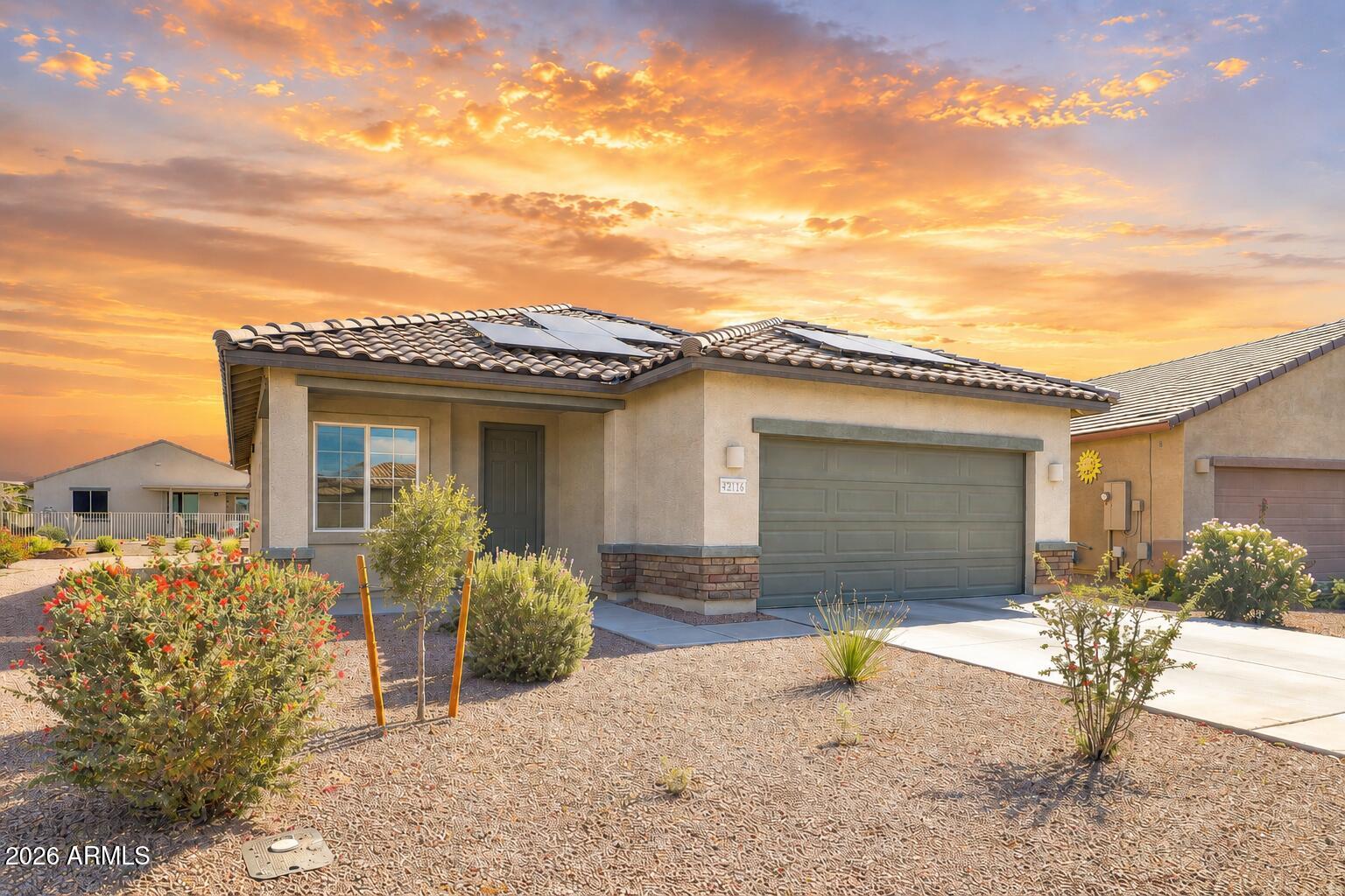 STOP THE SEARCH--THIS IS THE ONE! Located in the highly sought-after active adult community of Province in Maricopa, this beautifully upgraded 3-bedroom, 2-bath home offers the perfect combination of luxury, comfort, and resort-style living AND PAID SOLAR.  Step inside to discover an open-concept floor plan featuring granite countertops, stainless steel appliances, abundant cabinetry, and spacious living areas designed for both entertaining and everyday enjoyment. The thoughtfully designed layout offers generous bedrooms, modern finishes, and exceptional natural light throughout.  The backyard is your private Arizona retreat, complete with a covered patio, extended paver patio, and a professionally installed putting green--perfect for relaxing mornings, entertaining friends, or enjoying beautiful desert evenings.
Living in Province means enjoying one of Arizona's premier 55+ communities. Residents have access to a stunning 32,000-square-foot clubhouse, indoor and outdoor pools, state-of-the-art fitness center, pickleball and tennis courts, bocce ball, walking and biking paths, woodworking shop, library, ballroom, arts and crafts studios, fishing lakes, and a full calendar of clubs, activities, social events, and community gatherings.