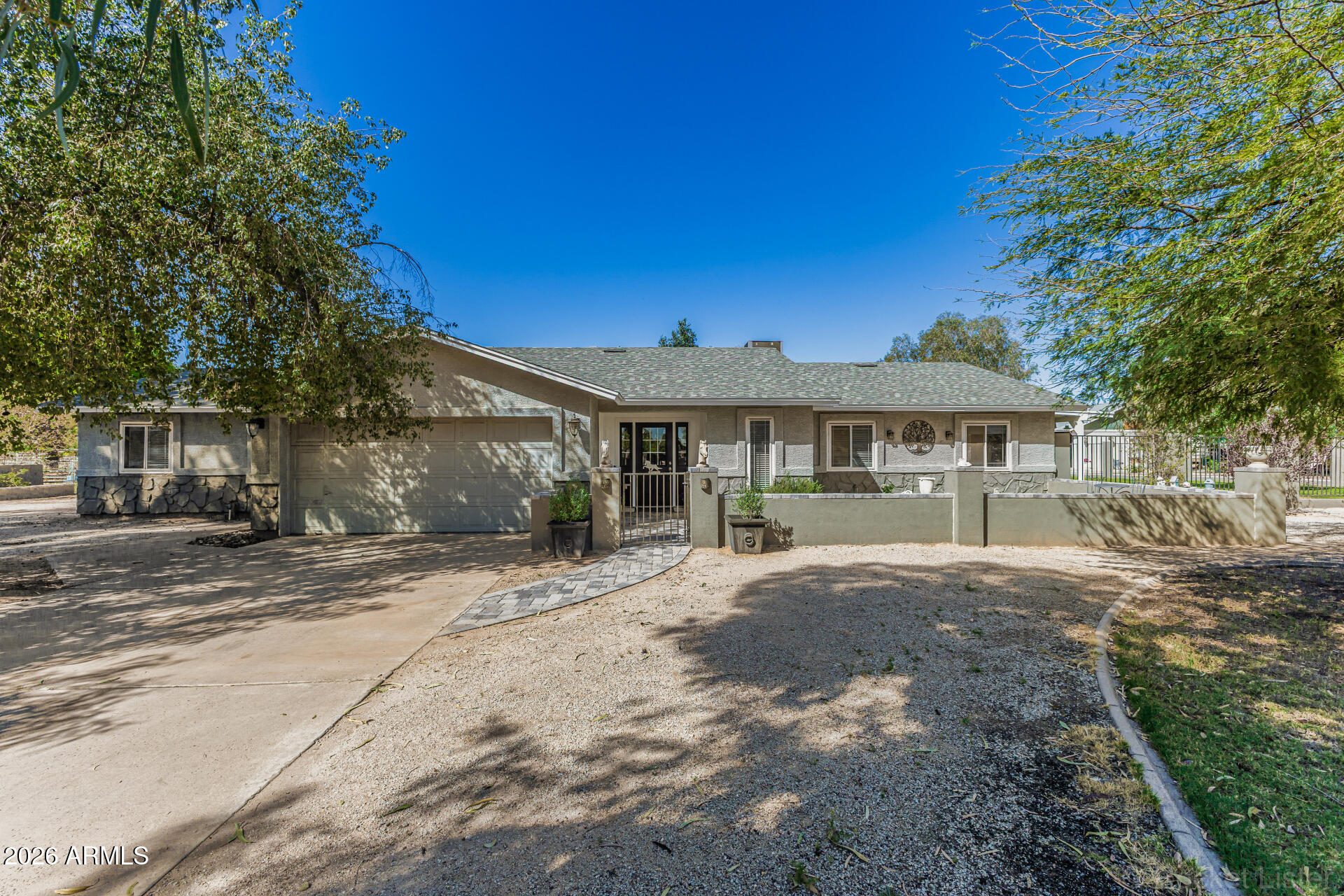 Price change on this one of a kind Income Potential - Equestrian Dream On Almost 2  flood Irrigated Acres!
Animal lovers and equestrian enthusiasts will fall in love with this fully fenced & gated  property offering incredible potential for horse boarding, an equestrian facility, or a private ranch retreat. Covered RV/ hay with ample open space and easy access throughout the property, this land is perfectly suited for stalls, paddocks, arenas, or boarding operations, creating an exciting opportunity for additional income while enjoying peaceful rural living next to the sparkeling pool!
A paved front patio and welcoming iron gate entry set the tone as you arrive at this charming home. Inside, a warm and inviting hallway showcases elegant wainscoting, wood-look flooring, and a soothing co that flows throughout the living spaces. Huge country kitchen, formal dinning, family room w/ fireplace large master w/ outdoor access to the pool, guest room, kennel room or additional bedroom w/ outdoor access and patio with a seperate yard for grandma and the family dog , fireplace in the family room and additional seperate office. This is a one and only property in the coveted area of Clearwater Farms.