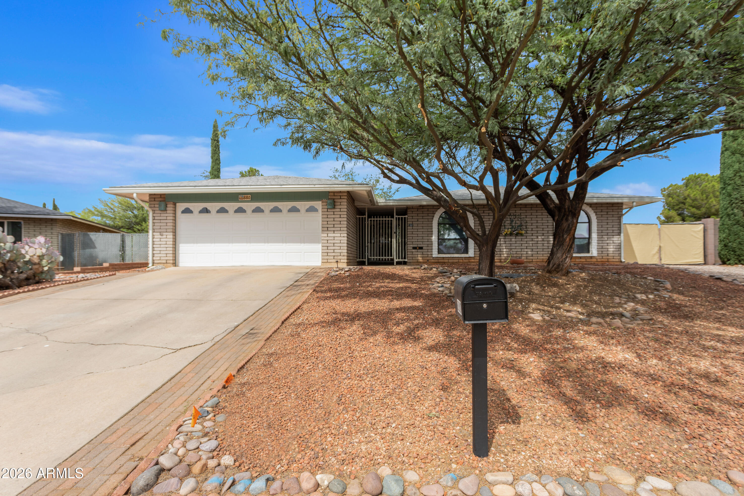 Move-In Ready 3BR/2BA with extra Bonus Space. Exceptional value meets pride of ownership in this well-maintained Southern Arizona property. Key highlights include a fully modernized kitchen, water softener,  carpet-free flooring throughout. and 2 bonus rooms. The generous lot features a beautifully landscaped backyard complete with a  storage shed, mountain views & opportunity for outdoor grill features. An ideal location close to amenities, shopping, and the transit line, this home offers maximum functionality and space.