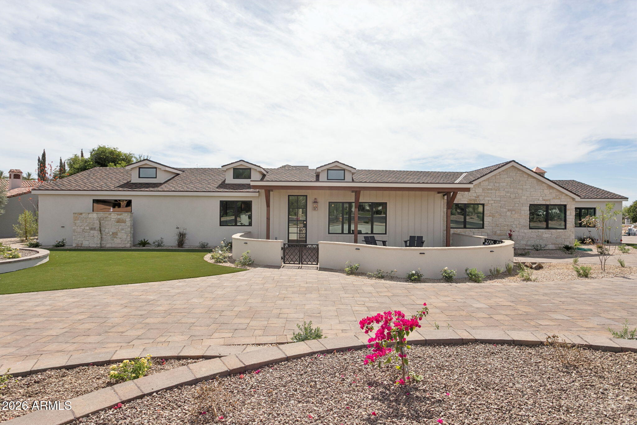 Situated on a private corner lot with stunning Camelback views. Completely new custom renovated home with charm - soaring ceilings, new kitchen, light oak floors and natural sunlight throughout. Come see your dream home today!