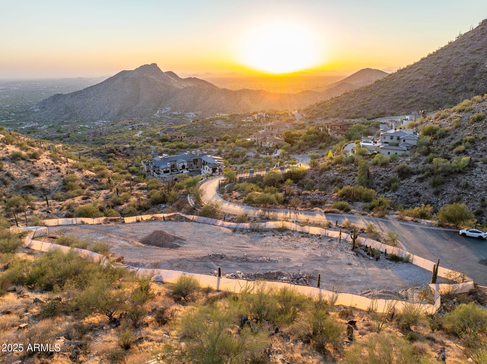 Imagine owning a piece of the Upper Canyon's most exclusive heights, in one of America's most prestigious communities. That place exists — it's called the Summit.

This is Silverleaf — a private sanctuary nestled against the McDowell Mountains in Scottsdale. It's home to championship golf, winding canyon roads, and a lifestyle reserved for those who understand true luxury. Every sunrise here feels like a private masterpiece.

Right now, there's a once in a lifetime chance to build your dream estate in the Summit, perched high in the Upper Canyon. Imagine 15 acres all to yourself with a two-acre building envelope ready to create a pure architectural artistry.

And if you're wondering where to start..... there are stunning architectural plans already available  but there's no requirement to use them. This is your blank canvas.

Here, privacy isn't just promisedit's absolute. Your home could sit above it all, capturing views that sweep from city lights to endless desert sunsets. This isn't just land... it's the future site of a legacy.

In Silverleaf, homes are statements. And opportunities like this don't wait around. The Summit is calling  the only question is: what will you build (create)?