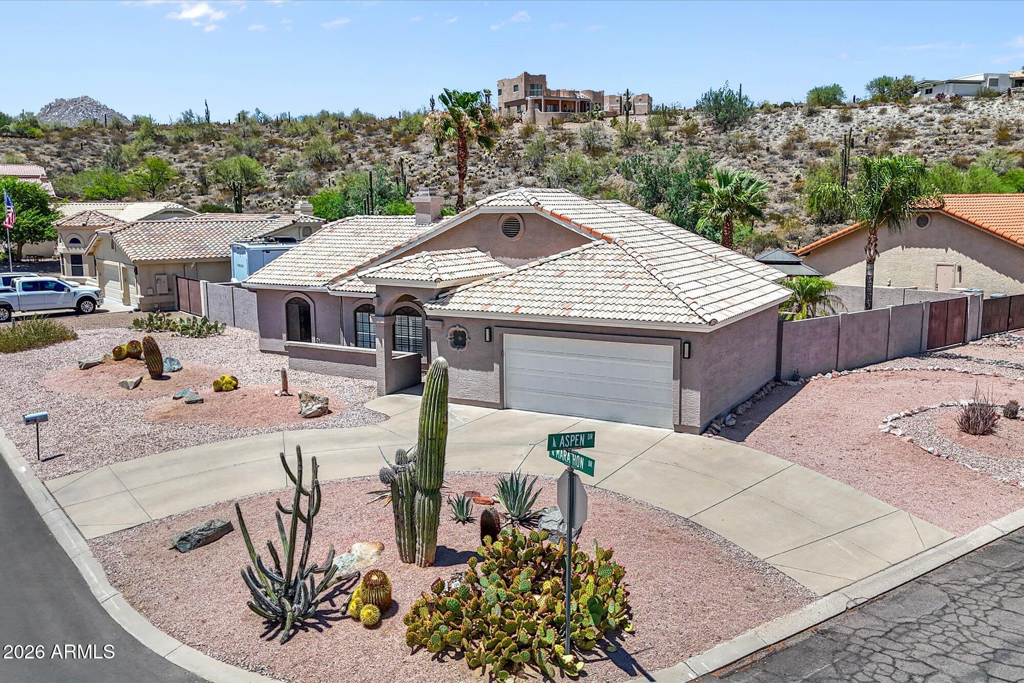 Desert living at its finest! This beautifully maintained 3 bed/2 bath home offers over 2000 sq ft of comfortable living space on a desirable corner lot with desert landscaping. Thoughtfully updated in 2024, the home blends modern finishes with timeless style. A new HVAC system was installed October 2024 to keep you cool on those warm AZ days. And behind that TV in the pics, is a gorgeous wood burning fireplace!
Outside, your own private oasis features a PebbleTec pool and a gazebo!
This home offers the ideal combination of style, comfort, and location in one of Arizona's most scenic communities, Fountain Hills!