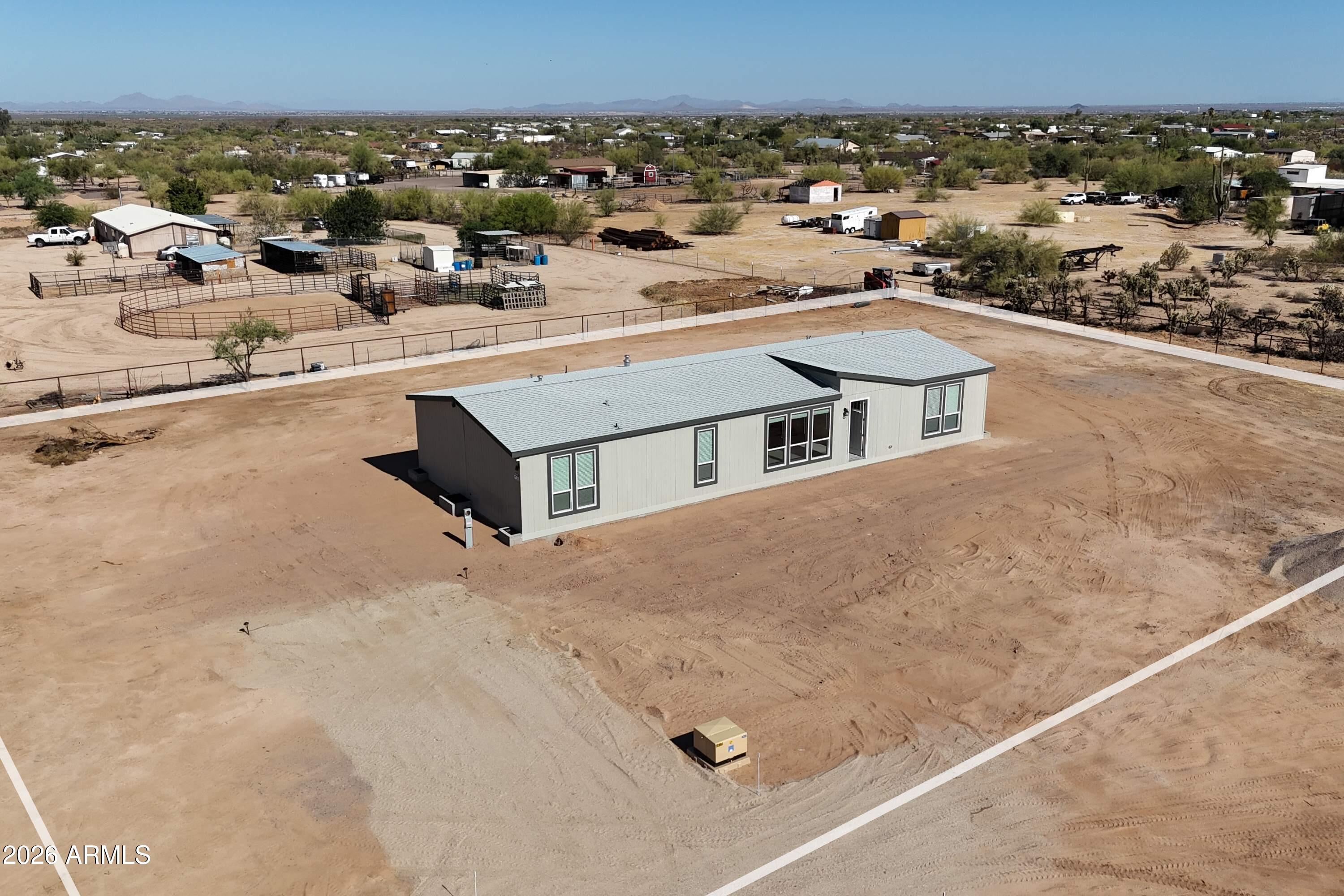 Welcome to your stunning 4 bed and 3 full bath 2160 sf home; Peaceful acre country living with easy access to growing employment, shopping, and services in nearby Florence, Coolidge, Queen Creek, and San Tan Valley. Amazing Open Kitchen and split floorplan with a hall, jack and jill and en-suite bathroom for a total of 3 baths! Horse property with desert views and mountain views. Room for your horse, livestock, toys, RV parking and Room for a workshop, pool, garage or ADU. No crowded subdivision, but rural feel with neighbors just the right distance away. You'll be on a private water system, so no well issues to fret about.  This is rural Arizona living at its finest in beautiful Cactus Forest just outside of Florence Arizona in your brand-new expansive home on acreage!