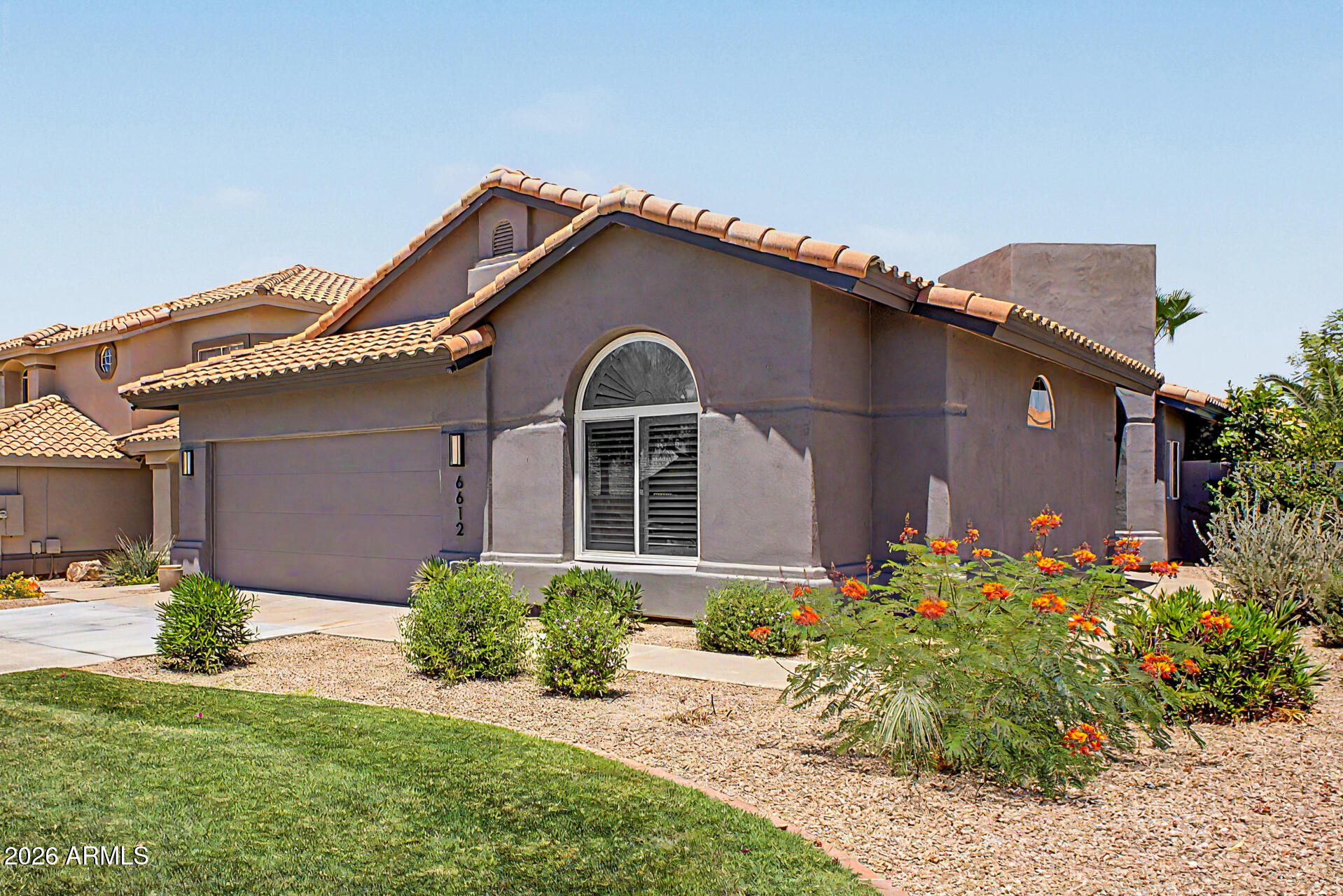 Welcome to your piece of paradise in the highly sought-after Red Mountain Ranch community of northeast Mesa! Situated on a premium corner lot, this stunning property showcases gorgeous tile flooring throughout, designer touches, and tasteful upgrades that make it feel like a true model home. From the moment you walk in, you'll appreciate the bright open feel and pride of ownership throughout. Step outside to your own private backyard paradise featuring a sparkling pool and relaxing outdoor living spaces perfect for enjoying Arizona's incredible year-round weather. Whether entertaining guests or unwinding after a long day, this backyard is designed for relaxation and enjoyment. Enjoy low-maintenance living with the HOA taking care of the front yard landscaping, giving you more time to enjoy everything this amazing area has to offer. Located just minutes from the Salt River, scenic hiking and biking trails, golf, lakes, and endless outdoor recreation, this home truly embraces the Arizona lifestyle.

Red Mountain Ranch is one of Mesa's most beautiful and welcoming master-planned communities, known for its lush parks, neighborhood lake, mature landscaping, and picturesque streetscapes. At the heart of the community is the semi-private Red Mountain Ranch Country Club, featuring an 18-hole championship Pete Dye golf course, pickleball & tennis courts, fitness center, swimming pool, and more, with optional memberships available.

Surrounded by the natural beauty of the Sonoran Desert while still close to shopping, dining, top-rated schools, and city conveniences, this exceptional home offers the perfect blend of luxury, comfort, and outdoor living. This is more than just a home, it's the Arizona lifestyle you've been dreaming of.