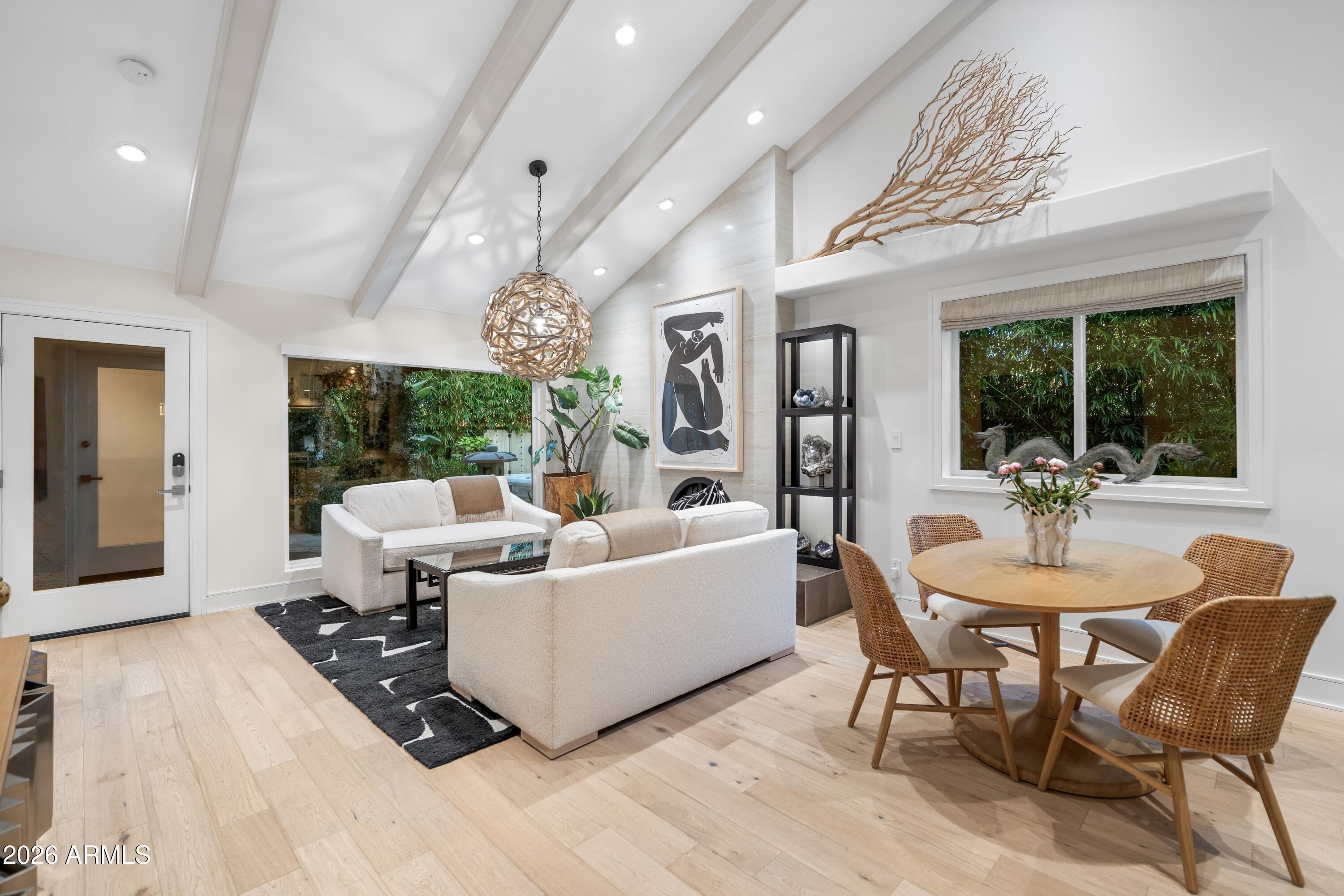 Architect David Wimmer prior residence, further curated by Modern Home design team, allowing natural light and open spaces throughout this jewel box. A private, lush paradise in the sought-after Resort Corridor, this beautifully remodeled 2 BR/2BATH corner-unit home has been artfully reimagined from the inside out. Custom steel work, cabinetry and window coverings define the interior, along with Fisher & Paykel appliances and a bright, open floor plan. The recently expanded outdoor space is truly one of a kind with a built-in hot tub, Japanese pa-goda, tropical landscaping and fully automated waterfall pond encircling a one-ton stone Buddha head by Kona Landscaping. The community area has a large pool, gym, and a newly remodeled courtyard and two-story designer clubhouse. Upscale... amenities, an ideal location and the utmost in privacy, this is the perfect home for those seeking luxury, security, and convenience. The ultimate in turnkey, resort-style living; and easy to preview!!