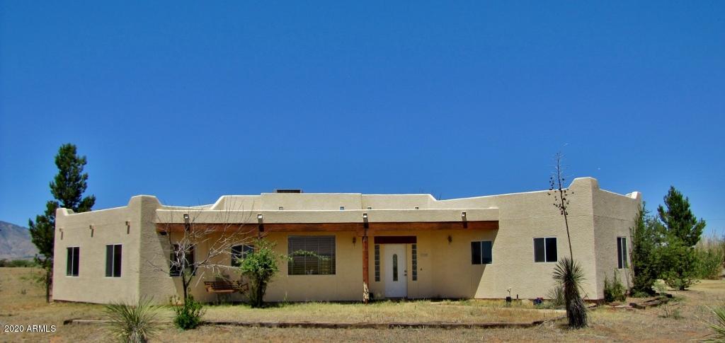 This 3BR/2BA/2CC, Santa Fe home sits on 6.37 Acres in Hereford, AZ a few minutes outside Sierra Vista, AZ and Ft. Huachuca. The home has an open floor plan, A/C, S/S appliances and tile floors throughout. Enjoy the horse facilities which include 3 Stall Barn, Tack Room, & Hay Storage. You will enjoy the awesome sunsets and mountain views. Call today.