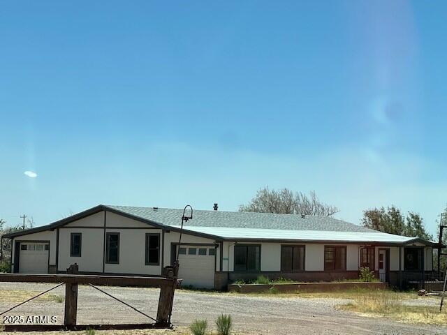 HUGE PRICE REDUCTION! Great investment property! Mountain views with easy access to Bisbee and Sierra Vista. Manufactured home partially renovated with additional home and and commercial building on the premises. So much potential!