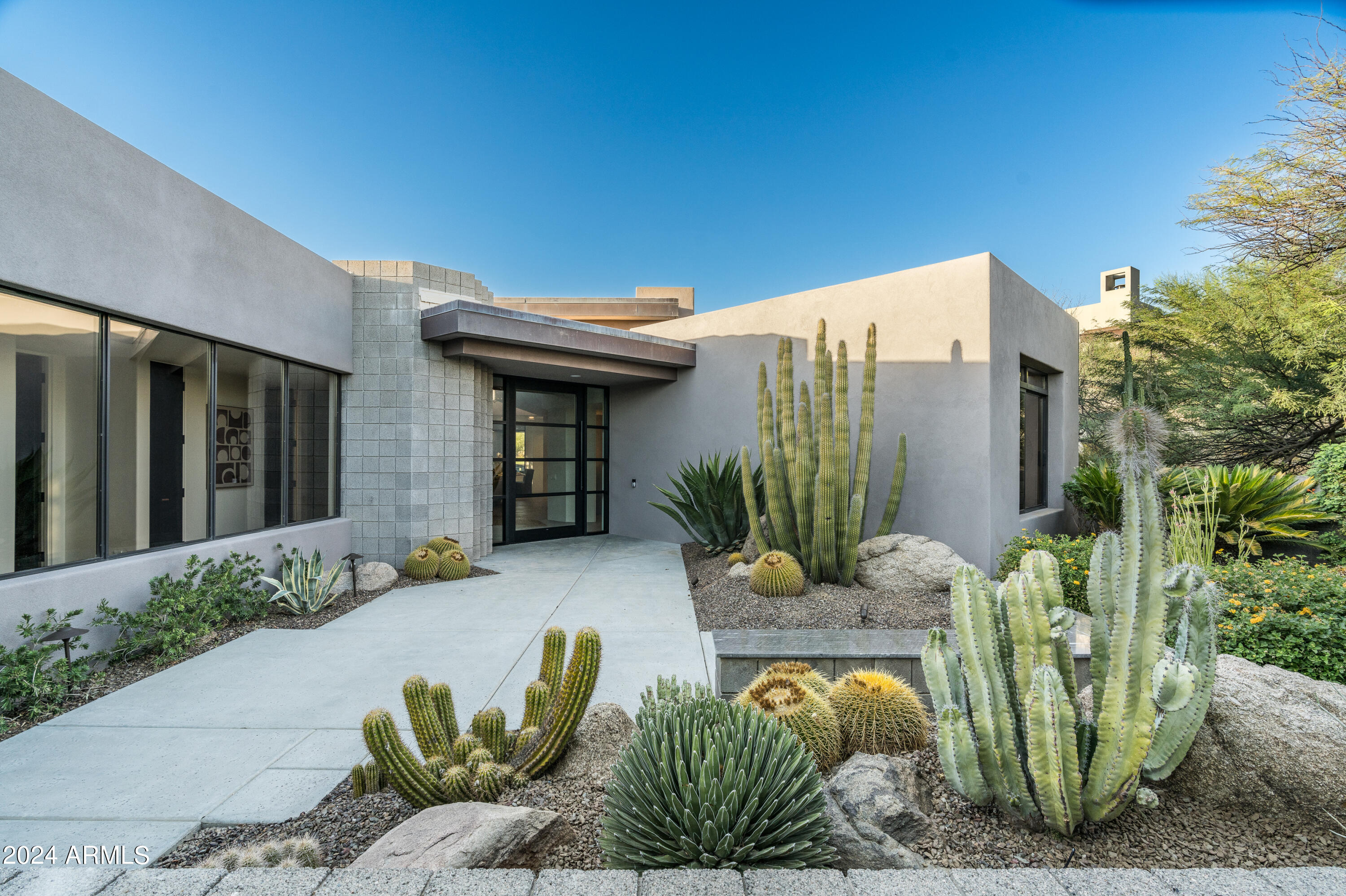 An incredible opportunity to own a luxurious, newly remodeled home in Desert Fairways at Desert Mountain. This premium lot sits on the 6th hole of the Apache golf course, offering the most incredible golf course and mountain views. Every luxurious finish has been carefully styled, from the custom walnut cabinetry to the top-of-the-line Subzero, Cove, and Wolf appliance package. Thoughtfully upgraded throughout, it boasts generous storage, a dog spa, custom-built wet bar, and a serene, low-maintenance yard with a heated ''spool'' (spa/pool). A Lifestyle Membership is available for purchase, (pending Club approval) to take advantage of the resort-style benefits of this prestigious North Scottsdale community.