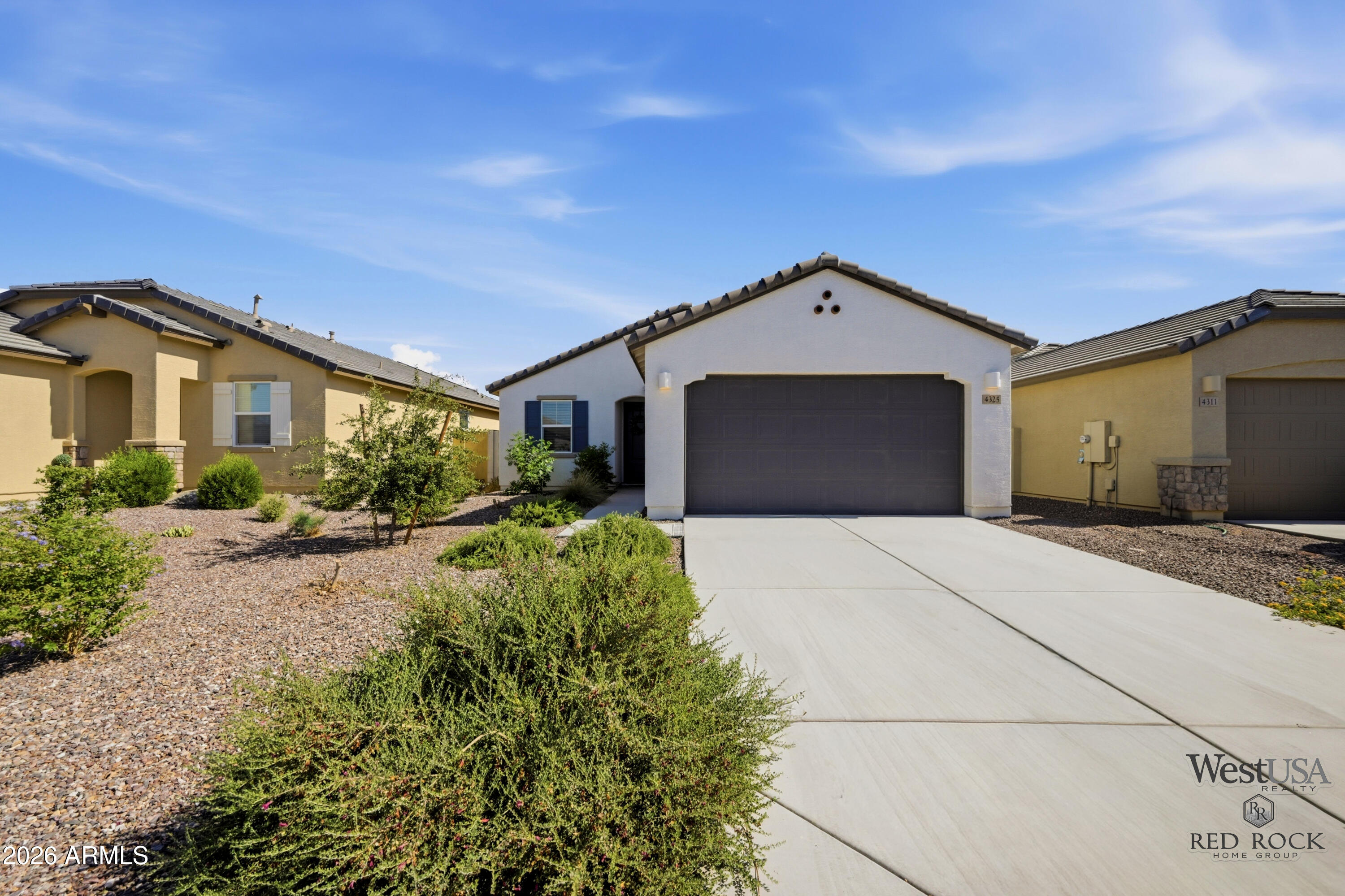 Built in 2023 by Lennar, this move-in ready home in San Tan Valley checks every box. Step inside to find 9-foot ceilings, a chef-inspired kitchen with a gas stove and clean, granite countertops, and thoughtful design touches throughout -- including a custom accent wall and shiplap detail that give this home a warm, elevated feel you won't find in every new build.
The community keeps your lifestyle going beyond your front door with pickleball courts, a resort-style pool, and a park -- all just steps away.
If you've been searching for a newer build with the upgrades already done, this is it.
