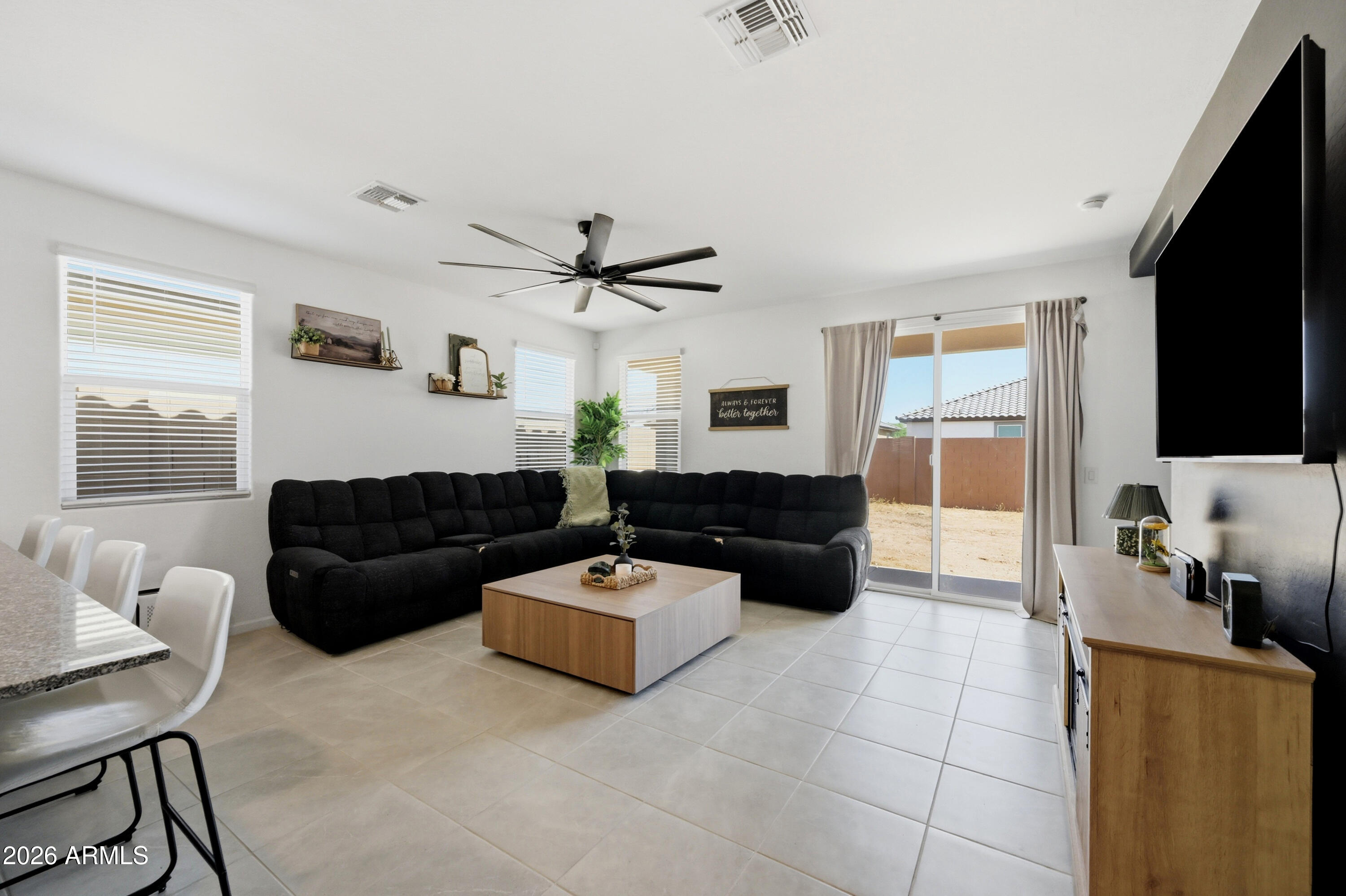Built in 2023 by Lennar, this move-in ready home in San Tan Valley checks every box. Step inside to find 9-foot ceilings, a chef-inspired kitchen with a gas stove and clean, granite countertops, and thoughtful design touches throughout -- including a custom accent wall and shiplap detail that give this home a warm, elevated feel you won't find in every new build.
The community keeps your lifestyle going beyond your front door with pickleball courts, a resort-style pool, and a park -- all just steps away.
If you've been searching for a newer build with the upgrades already done, this is it.