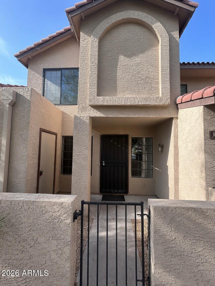 Step into this beautifully updated 2-story townhome featuring 2 bedrooms, 1.5 baths, and a private gated courtyard entry. Thoughtfully refreshed throughout with new flooring, fresh interior paint, updated lighting fixtures, a remodeled kitchen, and newer appliances, this move-in-ready home offers both style and convenience.
The main level showcases a spacious great room, a dining/breakfast area, and an upgraded galley kitchen complete with stainless steel appliances, including a newer microwave. A convenient powder room includes a stackable washer and dryer. Upstairs, you'll find two comfortable bedrooms, updated flooring, a ¾ bath, and newer carpeting on the staircase. The primary suite features a generous walk-in closet and a south-facing window. You don't want to miss this one!