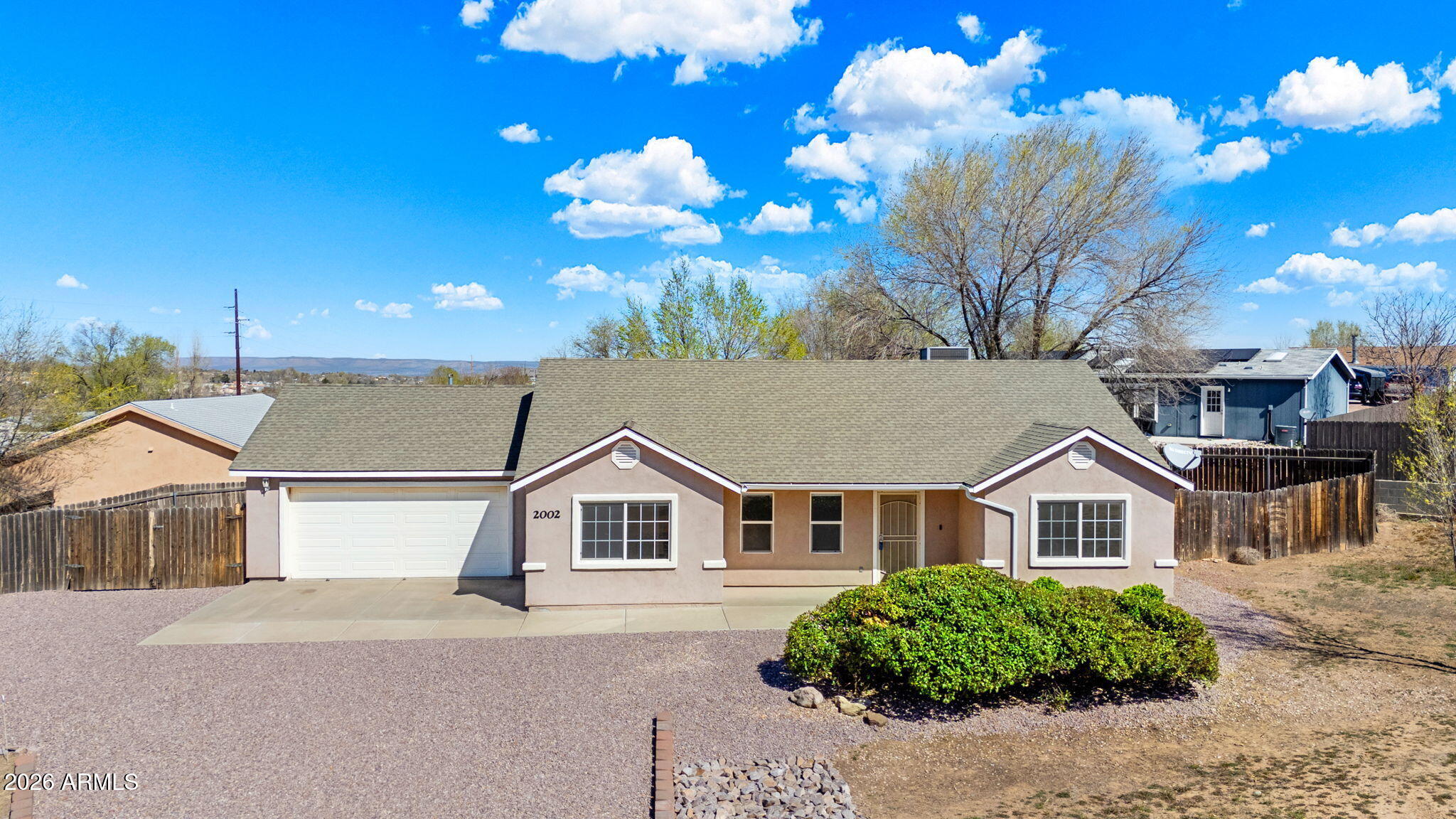Welcome to this charming 3-bedroom, 2-bath home in Chino Valley featuring a desirable split bedroom floor plan designed for comfort and privacy. The home offers a bright and inviting interior with freshly painted walls that create a clean, move-in-ready feel. The spacious kitchen comes fully equipped with all appliances included, making it easy for the next owner to settle in right away. The thoughtful layout separates the primary suite from the additional bedrooms, ideal for guests, family, or a home office. Step outside and enjoy the updated front and back landscaping, providing great curb appeal and outdoor space to relax or entertain. The perimeter rear fencing adds privacy and flexibility for pets, gardening, or outdoor activities. Additional highlights include a 2-car garage and a convenient location close to local amenities, shopping, and dining in Chino Valley. This well-maintained home offers comfort, functionality, and convenience--ready for its next owner to enjoy.