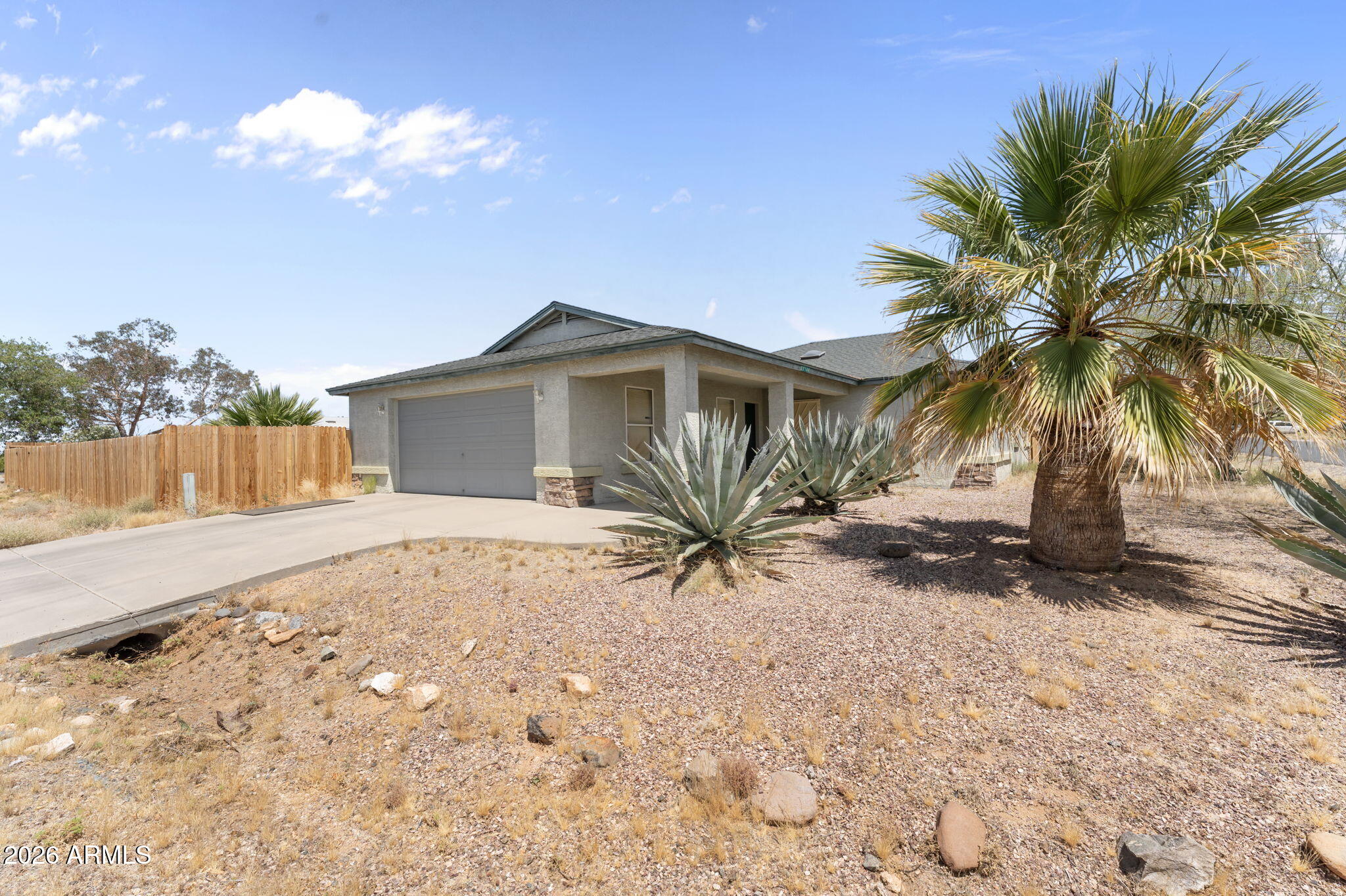 Tucked into a great neighborhood in Congress, this property offers the kind of privacy and small-town comfort that's hard to find. The owner recently invested approximately $15,000 in a new privacy fence and trees, creating a more secluded outdoor living space with added shade and a true ''backyard retreat'' feel. Enjoy wide-open views of the surrounding mountains, quiet streets, and the relaxed pace Congress is known for, while still being a convenient drive to Wickenburg for shopping, dining, and events. If you're looking for private living in a friendly community with room to breathe and beautiful Arizona scenery, 27144 S Bennett Way is a must-see.