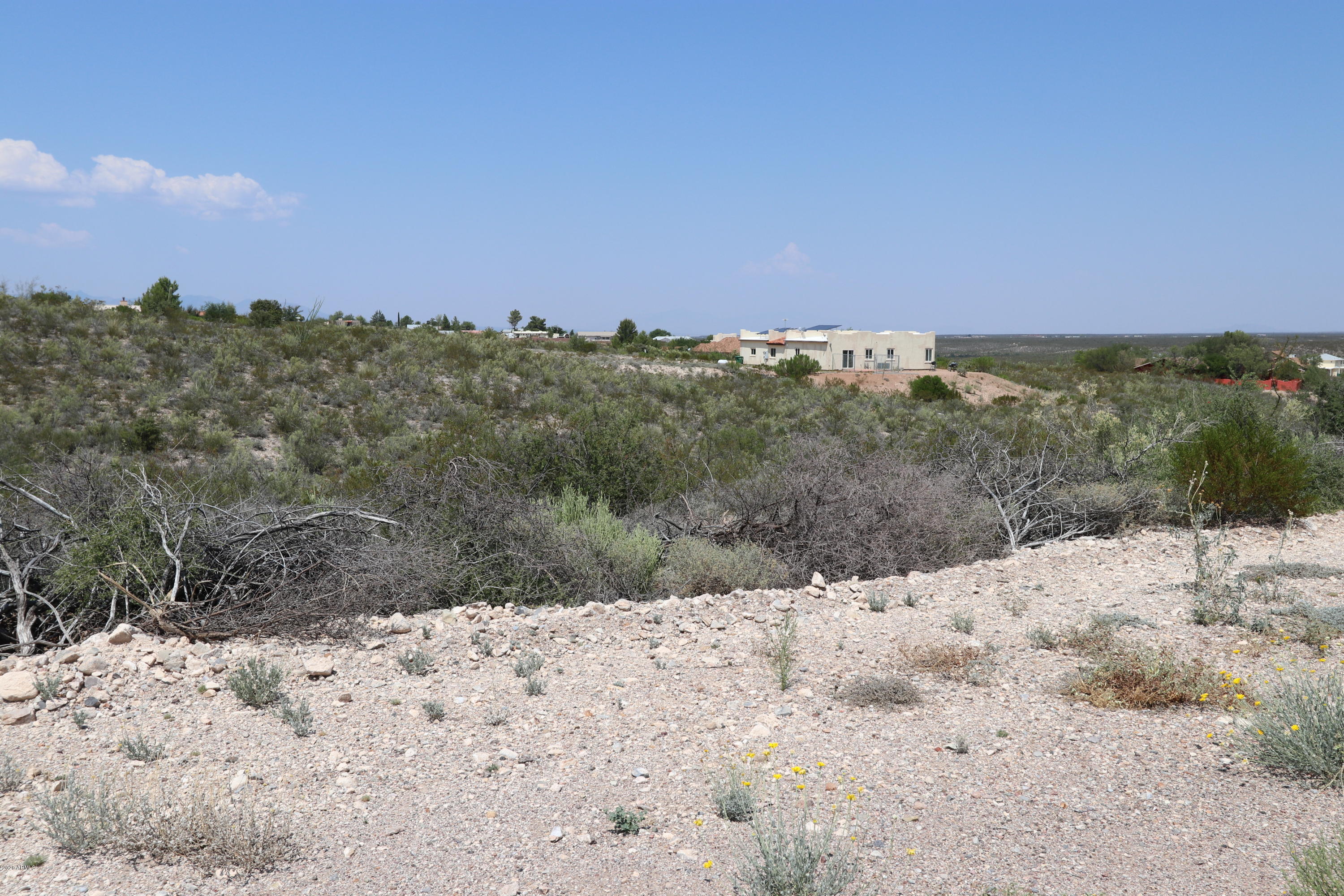 Single Family lot in Tombstone, AZ.   City water makes this great for investors or a single family home site. There is always lots of action going on in Tombstone. Tombstone is in Cochise County. Tombstone has a mild climate. Nearby towns are Benson AZ , Bisbee AZ, and Sierra Vista AZ. About an hour's drive to Tucson, AZ. Adjacent lot available if you need more room! Owner Financing possibility.