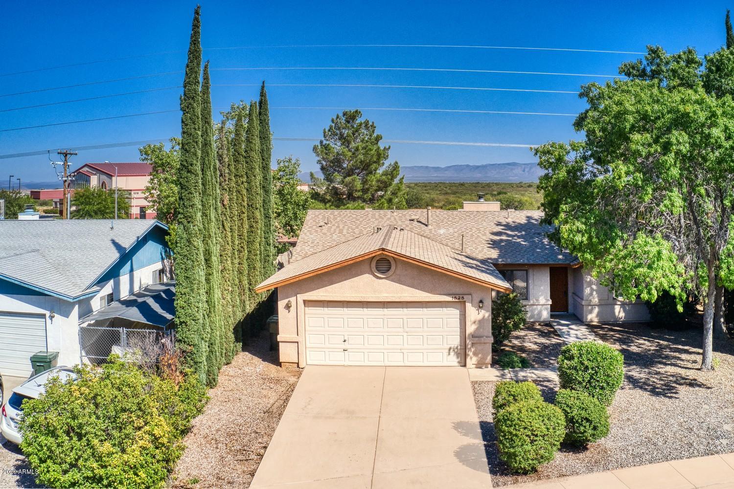 Looking for a house with a pool at a great price? Look no further! Split floor plan with open concept kitchen/living dining area. 3 bedrooms, 2 bath, 2 car garage, backyard has an in ground swimming pool, a dog run, a tree that provides great shade and a block wall.  Great in town location close to Fort Huachuca, schools, hospital, stores and restaurants. House has a brand new heating and cooling system. Check it out today!