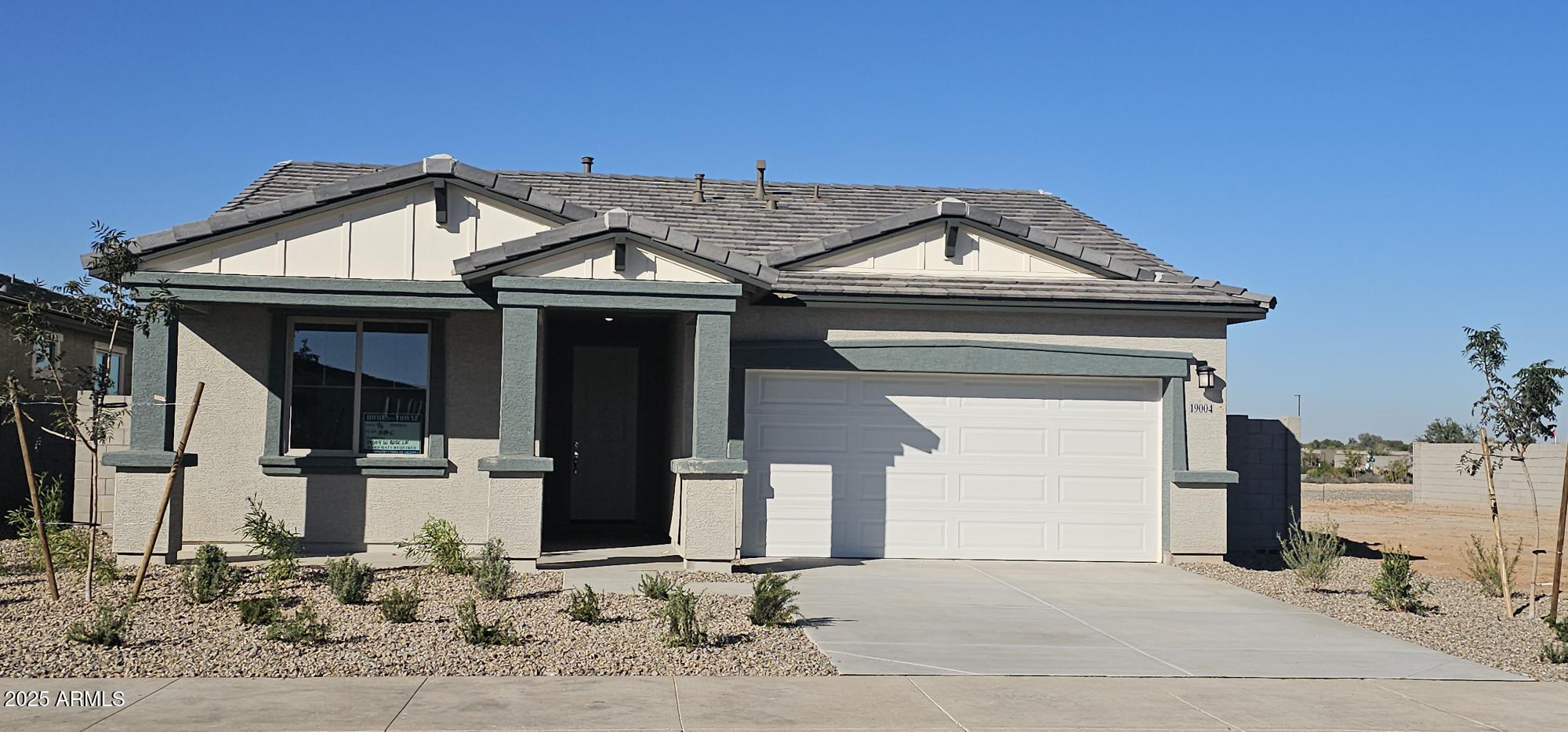 Amazing 3-bedroom 2 -bath MOVE IN READY home.  Open floorplan with extended ceramic tile throughout minus the bedrooms.    Beautifully designed kitchen with 42'' uppers cabinets with crown molding, trash pullout, stainless steel appliances, Gas range, tiled backsplash, oversized Quartz center island with single bowl undermount sink.  Beautiful owners bath with dual sinks, linen shelves included.  Enjoy the outdoors with the included oversized covered patio.  All rooms are pre-wired for ceiling fans, pre-wired for pendant lights over center island.  This home is ready for you. Take advantage of our special financing. Don't miss out on this! PHOTOS ARE OF THE MODEL HOME. FOR A LIMITED TIME, SELLER IS OFFERING 6% TOWARDS CLOSING COST / RATE BUYDOWN