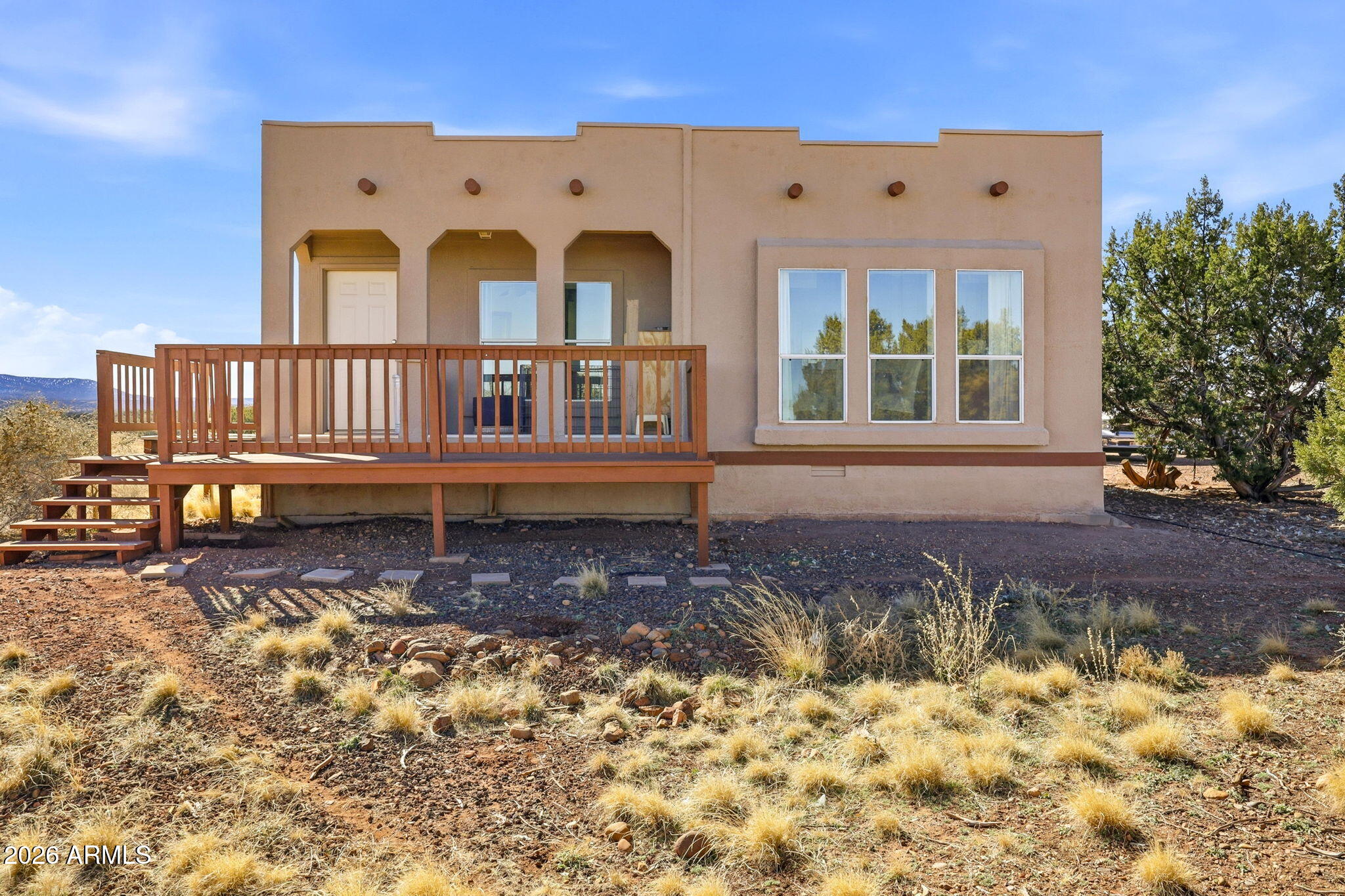 Off-grid living with phenomenal southern views in this charming Southwest-style home. The landscaped garden area sits below the home and is equipped with irrigation for easy growing. A bonus 40' container with an adjacent pit was originally designed as a root cellar and offers flexible potential for a pond, underground greenhouse, or shelter. Additional outdoor features include a chicken coop, well house, and storage shed. Inside, enjoy a remodeled interior with a cozy wood stove, large windows framing the stunning views, and a spacious primary suite featuring a soaking tub, walk-in shower, and private deck. A versatile bonus room offers space for a potential third bedroom or office. Located approx. 25 mins from Snowflake, at an elevation of around 5600 ft. State land very close by. Solar System:
A little over 6000 watts in the panels.
48 volts from 24 batteries.
Capacity is 1,150 Ah
2 x Outback 80 amp Charge Controllers
2 x Magnum Inverters - 4400 watts each
The system is Pure Sign Wave
Midnight Combiner Box