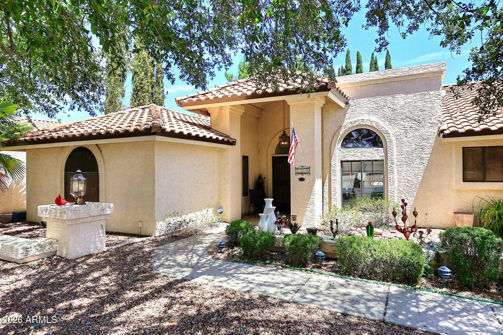 Beautiful light, bright well cared for 3 bed, 2.5 bath home near the end of a cul de sac.  The backyard has a beautiful well maintained Pebble Tec pool with water feature surrounded by mature trees including citrus.  All the rooms are light/bright and have vaulted ceilings. The great room/family room has a wood burning fire place, lots of cabinets for storage, granite counters, breakfast bar, dining area with access to the patio through sliders as well as the half bath which leads to the garage. The formal living/dining room also has sliders to the patio and great views of the pool and beautiful backyard.  Primary bedroom also has slider access to the patio and pool.  All this and more in a quiet friendly neighborhood. Oversized 2 car garage with storage cabinets.  Roof and AC updated 2020
