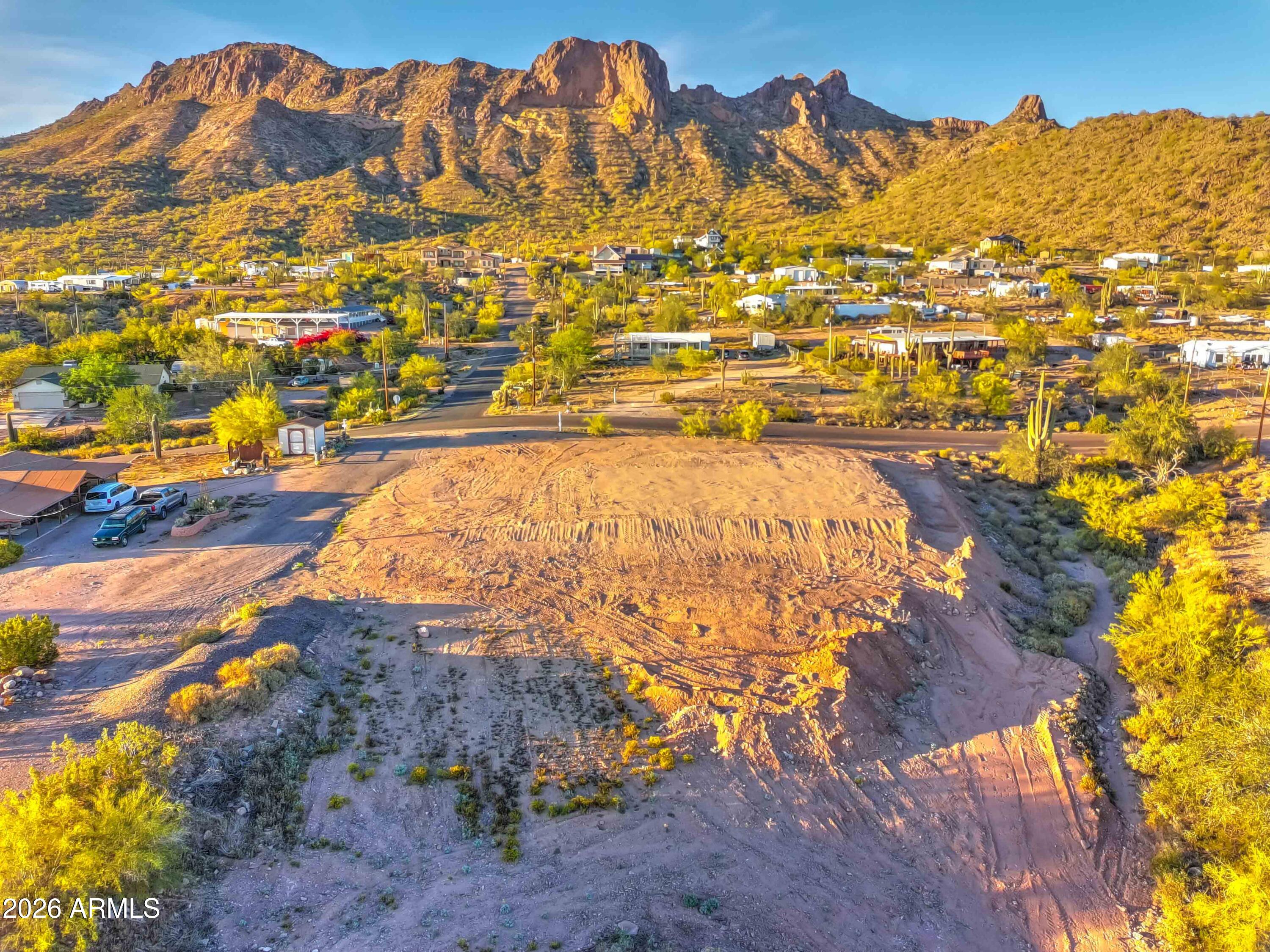 Enjoy amazing city lights and mountain views from this elevated 1.25 acre lot.  4,000 sq ft building
pad is compacted and ready to go. Compaction test report is on file and included in sale for submittal to County.  Seller is a Contractor and will also assist in expanding pad if larger area is needed by buyer.   Whether looking to build your dream home or finding the perfect spot for a manufactured home.  Don't miss this one.