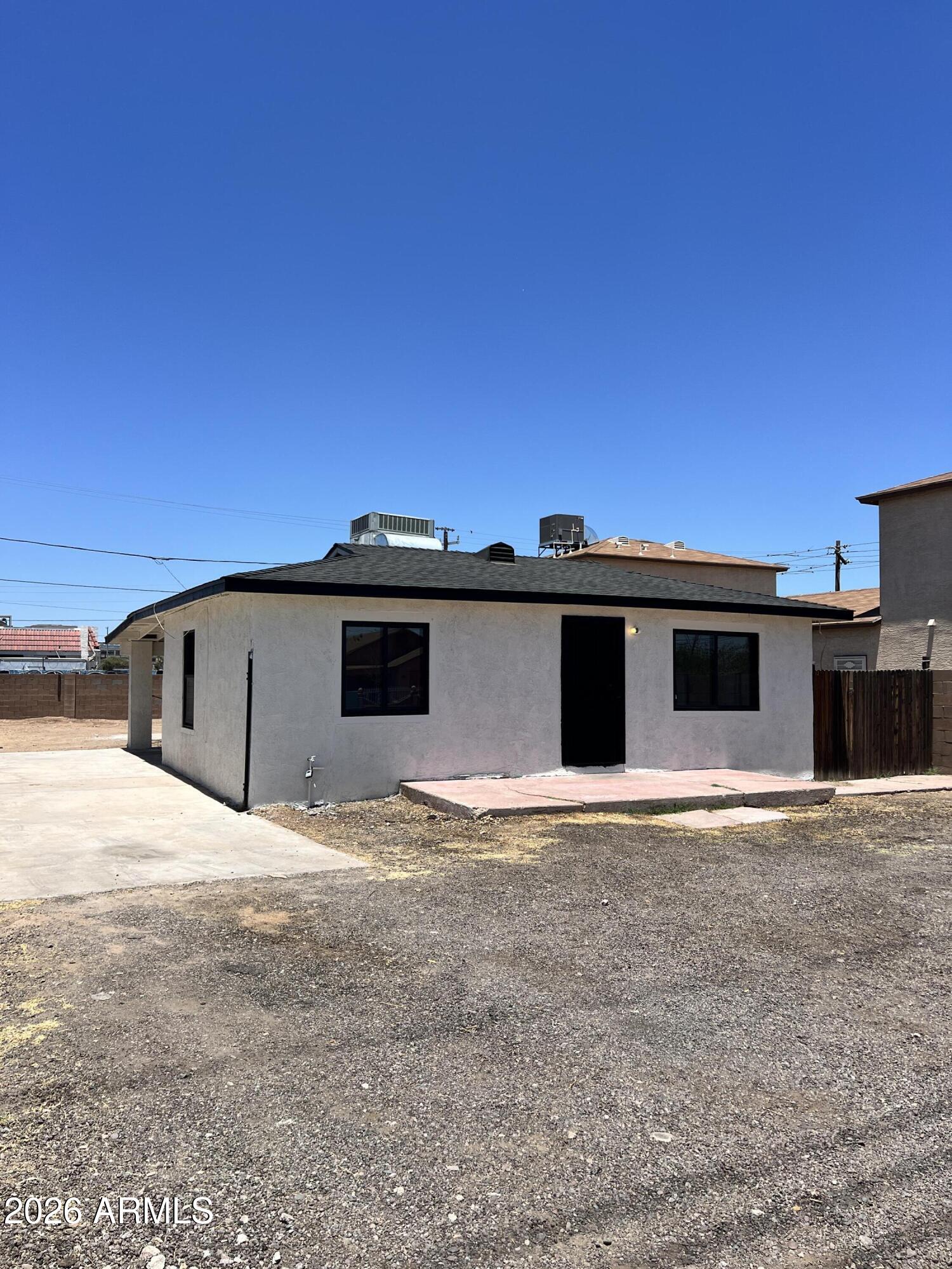 Contractor yard with office. Zoned C-3 with a ton of upside and just a tremendous opportunity for an owner user or an investor with an aggressive price point. The building could serve as office space for admin while most similar properties in the area utilize the lot in the back for parking or storage. Typical rents for this property type start at $2,500 per month NNN as seen in the proforma. The building has front parking area with freshly painted interior and exterior, new LVP flooring, updated plumbing, and a new roofing system. There is a wealth of space in the rear to add shipping containers or build a small warehouse for extra storage. The interior of the building features tile flooring, a private, full bathroom, open kitchenette, aluminum windows, and a patio.