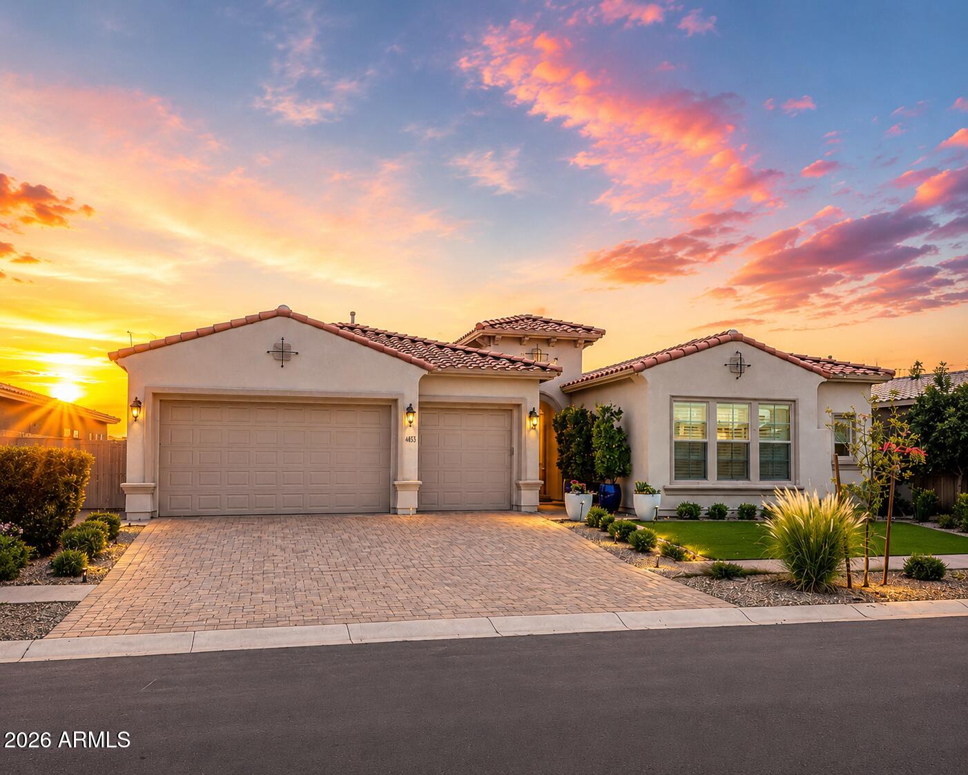 Experience luxury living at its finest in this spectacular David Weekley ''Hildmann'' residence in the award-winning Eastmark community. Perfectly positioned on a premium homesite, this exceptional home showcases over $390,000 in builder upgrades and designer enhancements, blending timeless elegance with modern functionality.

From the moment you enter, you're welcomed by soaring 12-foot ceilings, custom two-tone designer finishes, and expansive multi-slide stacking glass doors that create an effortless connection between the sophisticated interior and the resort-inspired outdoor living spaces. Every detail has been thoughtfully curated to deliver an elevated lifestyle. At the heart of the home is a true chef's kitchen featuring a premium GE Monogram Professional appliance package, including a 48-inch built-in refrigerator, gas cooktop with custom hood, double wall ovens, farmhouse sink, stunning waterfall quartzite island, custom two-tone shaker cabinetry, beverage center, butler's pantry, and a dedicated wine room with custom built-ins--designed for both everyday living and unforgettable entertaining.

The luxurious owner's retreat offers a private sanctuary complete with a freestanding soaking tub, oversized spa-inspired super shower, designer finishes, custom cabinetry, quartz countertops, and an expansive walk-in closet. A private guest suite with its own en-suite bath provides exceptional comfort for family or visitors.

Designer upgrades continue throughout with premium Level 11 wood-look tile flooring, custom cabinetry by BJ Tidwell, upgraded lighting, smart home technology, structured wiring, LED accent lighting, Venetian Bronze hardware, upgraded trim, designer tile selections, and thoughtful built-in storage throughout.

Step outside to your private backyard oasis where expansive covered patios, stacking glass walls, lush landscaping, upgraded pavers, and a stunning custom pool and spa create the perfect Arizona retreat. Whether hosting guests or enjoying a quiet evening at home, the seamless indoor-outdoor design makes every day feel like a luxury resort.

Located in one of Mesa's most sought-after master-planned communities, residents enjoy Eastmark's award-winning amenities including The Mark clubhouse, resort-style pool, parks, playgrounds, walking trails, Steadfast Farm, community events, and top-rated schools, all just minutes from shopping, dining, golf, and convenient freeway access.

This is a rare opportunity to own one of Eastmark's most highly upgraded luxury homes where exceptional craftsmanship, thoughtful design, and premium finishes come together to create an extraordinary living experience.