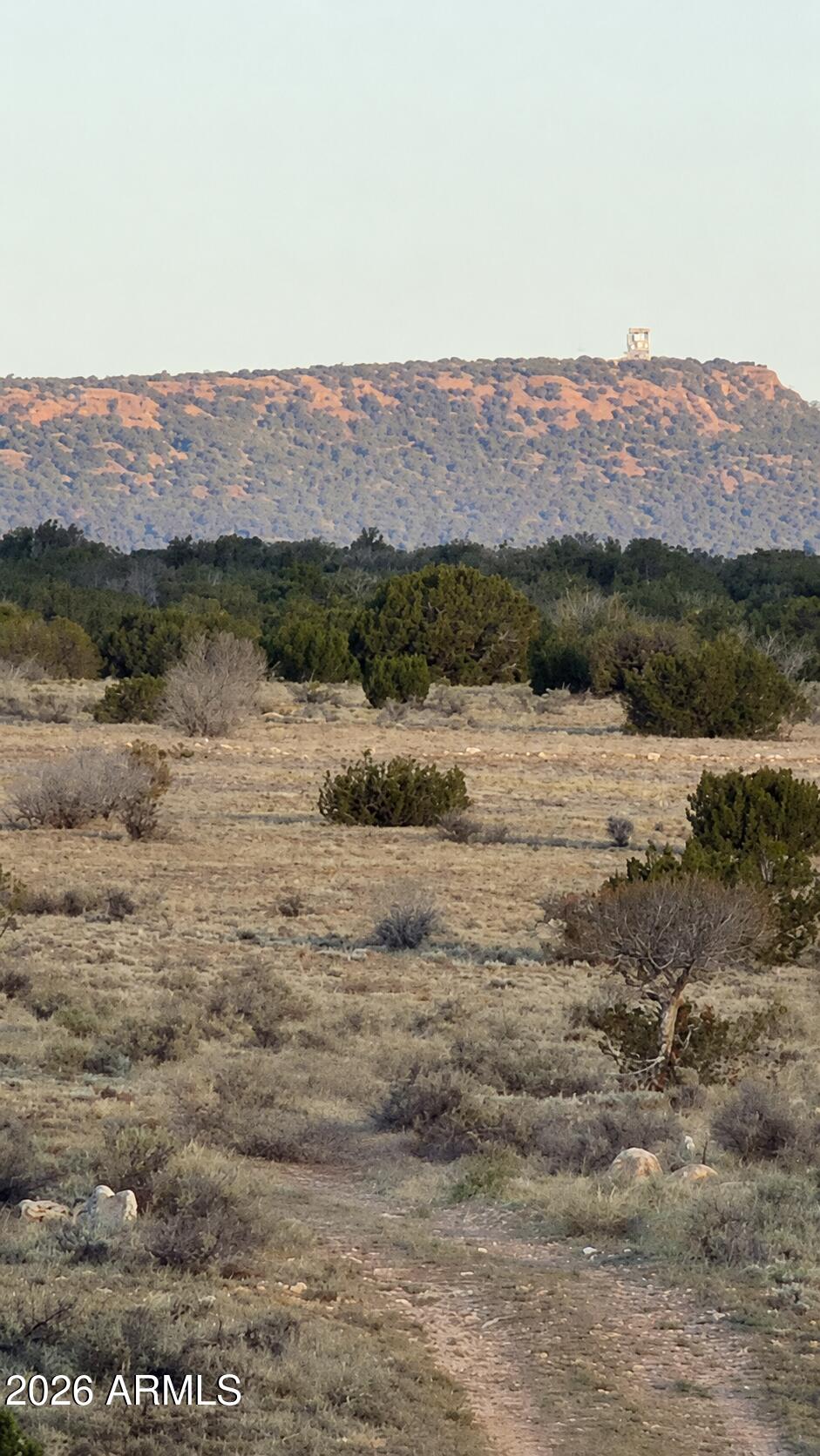 Escape to wide-open Arizona skies with this incredible **5-acre parcel bordering State Land on the north side**, offering endless opportunities for recreation, investment, or your future dream getaway. Enjoy the added privacy and breathtaking views that come with having State Land as your neighbor.

Convenient access is available either through the roads in the **Chevelon Acres** area or by traveling through **Chevelon Canyon Ranch**. Whether you are looking for a peaceful retreat, a place to camp, or land to hold for the future, this property offers the freedom and beauty that Northern Arizona is known for.
The property currently does not have water or power; however, buyers may have the opportunity to join the **Jackson Hole Water Co-op** for hauled water service.