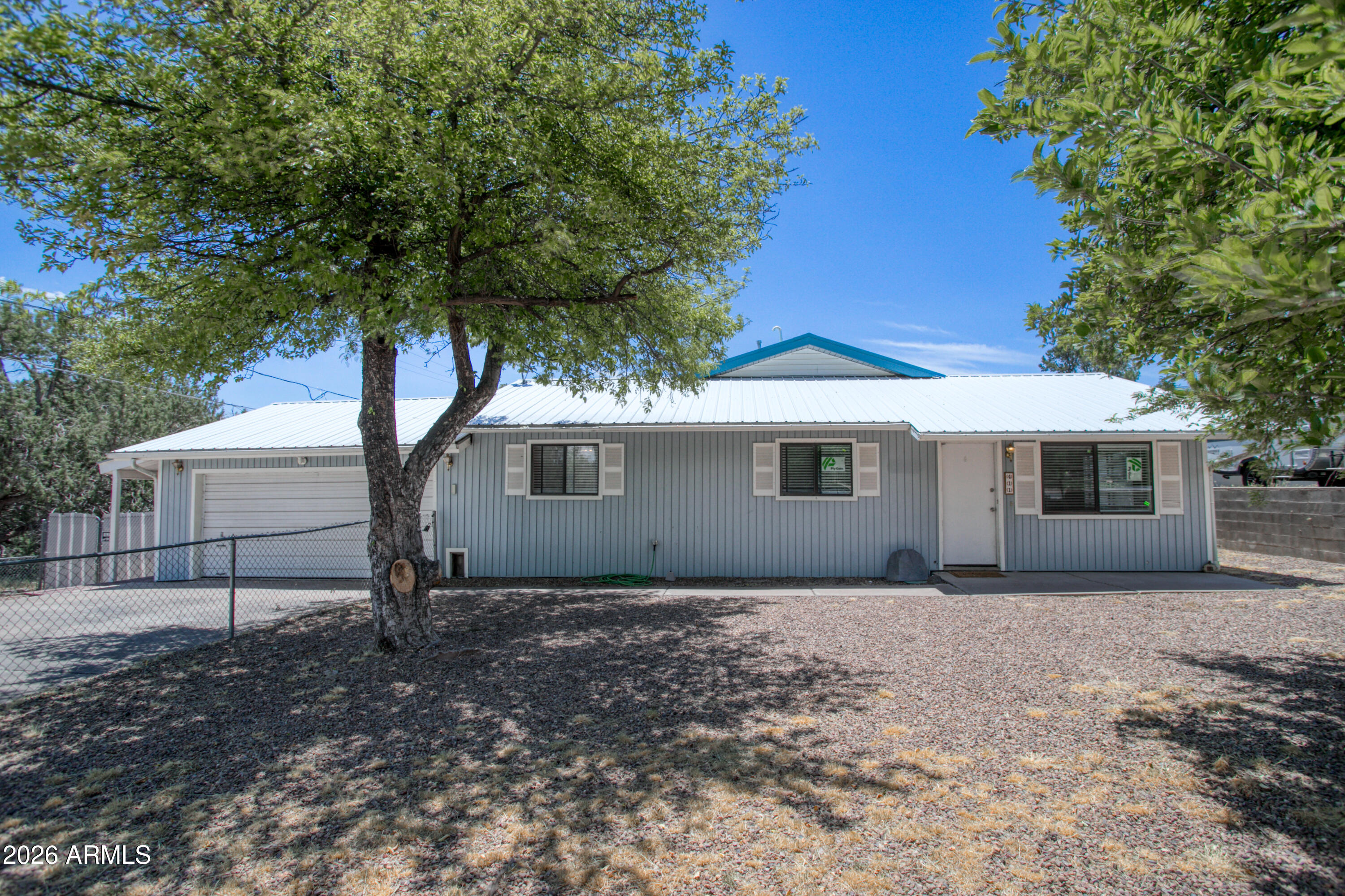Discover the perfect combination of space, comfort, and versatility with this beautifully maintained 4-bed, 2-bath home in Show Low. Set on a spacious 0.35-acre lot, this 1,804-square-foot home offers a functional layout designed for both everyday living and entertaining. The private primary suite is a peaceful retreat with French doors opening to the backyard, a spa-inspired ensuite featuring a soaking tub, walk-in tiled shower, and a generous walk-in closet. Two additional bedrooms and a guest bath provide plenty of room for family and guests, while the inviting living room seamlessly connects to the galley-style kitchen and eat-in dining area. The flexible fourth bedroom (no closet) is perfect for a home office, den, hobby room, or workout space and includes its own exterior entrance. Outside, you'll find a huge, fenced backyard with endless possibilities for entertaining, gardening, pets, or play. The entire front and back yard are fully fenced.

A large utility shed provides additional storage for tools, equipment, and outdoor gear.

Conveniently located near shopping, dining, schools, and all that Show Low has to offer, this property is ready to welcome you home!

Ideally located near the heart of Show Low, this home offers convenient access to shopping, dining, medical facilities, schools, close by City Park with playgrounds and walking paths, Aquatic center and everyday amenities while still enjoying the beauty of the White Mountains.

This home is just minutes away from Fool Hollow Lake Recreation Area provides opportunities for fishing, kayaking, boating, hiking, wildlife, and picnicking among the towering pines. Whether you're looking for outdoor adventure or the convenience of being close to town, this location offers the perfect blend of both.

***

Discover the White Mountains of Arizona, where adventure, beauty, and fresh mountain air come together. Enjoy four stunning seasons, 40 lakes, and 600+ miles of rivers and streams, perfect for fishing, kayaking, and exploring.

Hit the trails on one of the largest trail systems in the Southwest, or spend winter days at Sunrise Ski Resort, just 60 minutes away with three mountains of skiing, snowboarding, and sledding.

Love shopping or culture; wander through antique shops, summer arts & craft fairs, and lively music festivals. Golfers can tee off at seven scenic courses, including three public gems.

It's no wonder Pinetop-Lakeside was voted the "Best Cabin Region in the U.S."

The White Mountains, Arizona's best-kept secret. Come explore and embrace the MAGIC!
