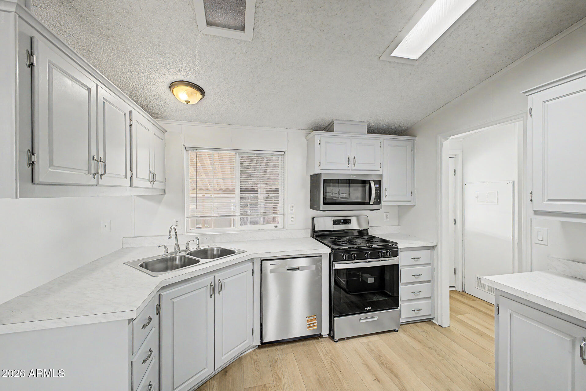 Welcome to this beautifully remodeled 5-bedroom, 2-bath double-wide manufactured home offering over 2,000 sq ft of stylish, move-in-ready living in desirable Northeast Phoenix! Updated in 2026, this spacious home features an open-concept floor plan, updated flooring, modern fixtures, and expansive living areas perfect for entertaining or everyday comfort. The split-bedroom layout offers added privacy, highlighted by an oversized primary suite, while additional bedrooms provide flexibility for guests, a home office, or multigenerational living. Ideally located near Desert Ridge, Loop 101, shopping, dining, entertainment, and major employers. Close to Paradise Valley Community College and located within the highly rated Paradise Valley Unified School District.