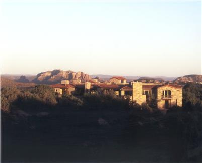 The romantic architecture of an Italian villa brought to Sedona in an authentic replication by Design Group architects. Strategically positioned on an 8.78-acre hilltop site bordering National Forest Service to maximize privacy & the 360 degree panorama of the red rock rims which have brought international acclaim to this jewel of the Southwest known as Sedona. A dramatic gated approach eloquently presents the commanding grandeur of its fully clad natural stone facade & architecture. Approximately 9362 square feet of living space features four bedrooms, eight bathrooms, billiard room, media room & a separate office with gym. Fine finishes such as Venetian plaster, reclaimed timber, stone floors, & imported Italian windows & doors are just the beginning... (see supplement for full remarks) The romantic architecture of an Italian villa brought to Sedona in an authentic replication by Design Group architects. Strategically positioned on an 8.78-acre hilltop site bordering National Forest Service to maximize privacy & the 360 degree panorama of the red rock rims which have brought international acclaim to this jewel of the Southwest known as Sedona. A dramatic gated approach eloquently presents the commanding grandeur of its fully clad natural stone facade & architecture. Approximately 9362 square feet of living space features four bedrooms, eight bathrooms, billiard room, media room & a separate office with gym. Fine finishes such as Venetian plaster, reclaimed timber, stone floors, & imported Italian windows & doors are just the beginning of the rich elegance that permeates every room. Superb outdoor living provides an oversized swimming pool, hot tub, summer kitchen, & enchanting covered patio with fireplace. All furnishings & fine art offered separately.