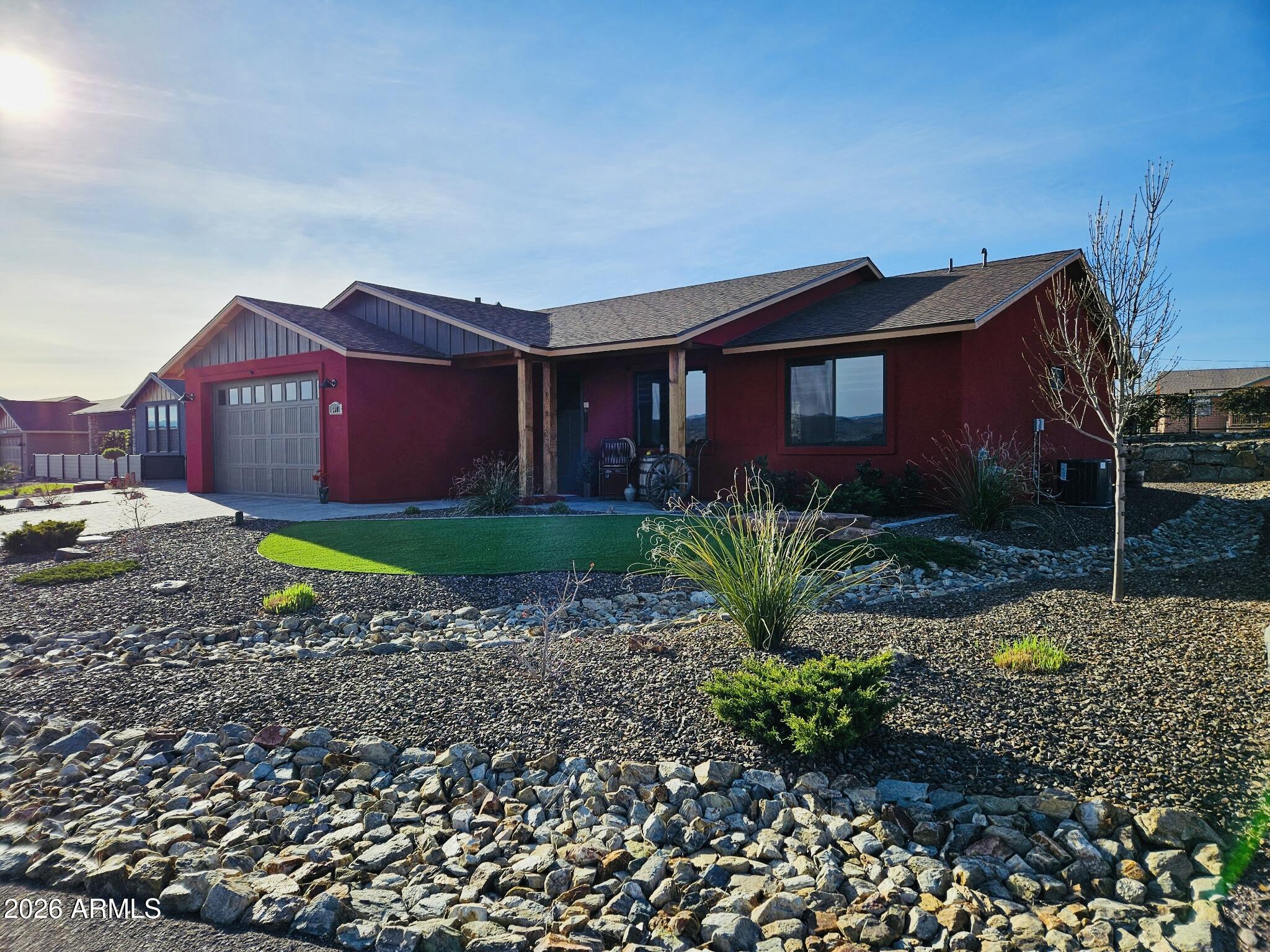Located in a prime Cottonwood location just above Old Town, this gorgeous 2021 home offers views of Sedona, Sycamore Canyon, and Jerome with direct trail access into Old Town's shops, restaurants, and tasting rooms. Situated in a non-HOA area with no rental restrictions, the home is an ideal as a residence, vacation home, or investment. The custom designed home offers a split 3-bedroom, 2-bath layout and features a beautifully designed floor plan.  Along with being Energy-efficient, it has Energy star air+ indoor filtration and an efficient cathedral foam insulation package. This is the  low-maintenance property you've been waiting for. An absolute must see!