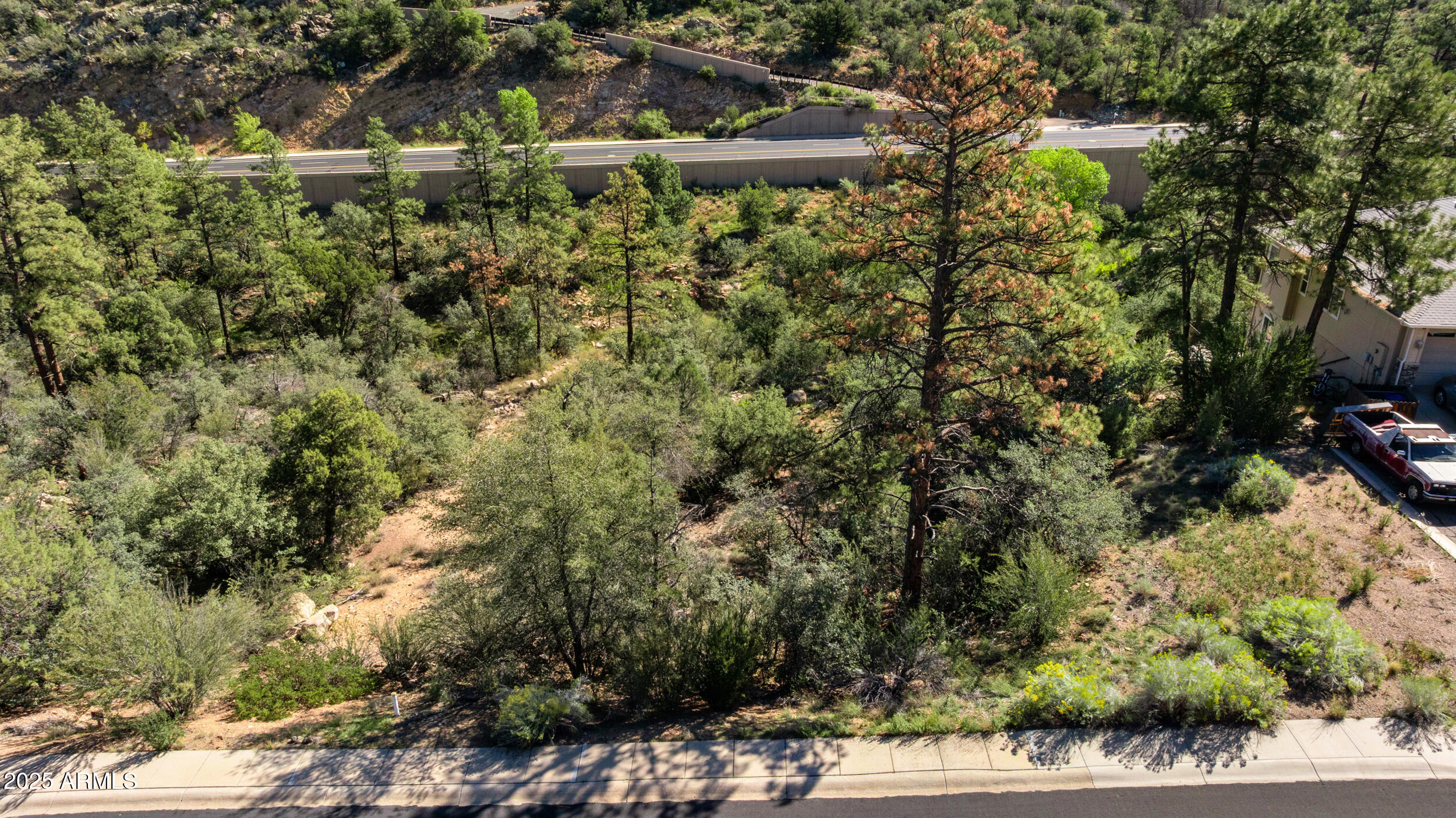 Beautiful Lot in Shadow Valley Ranch. This Williamson Valley property is located in the City of Prescott with NO HOA. Paved road on this .80 acre homesite makes this a wonderful Location-Location-Location for a New Home Build. Located approximately 4 miles to Downtown Prescott's Whiskey Row and Town Square.