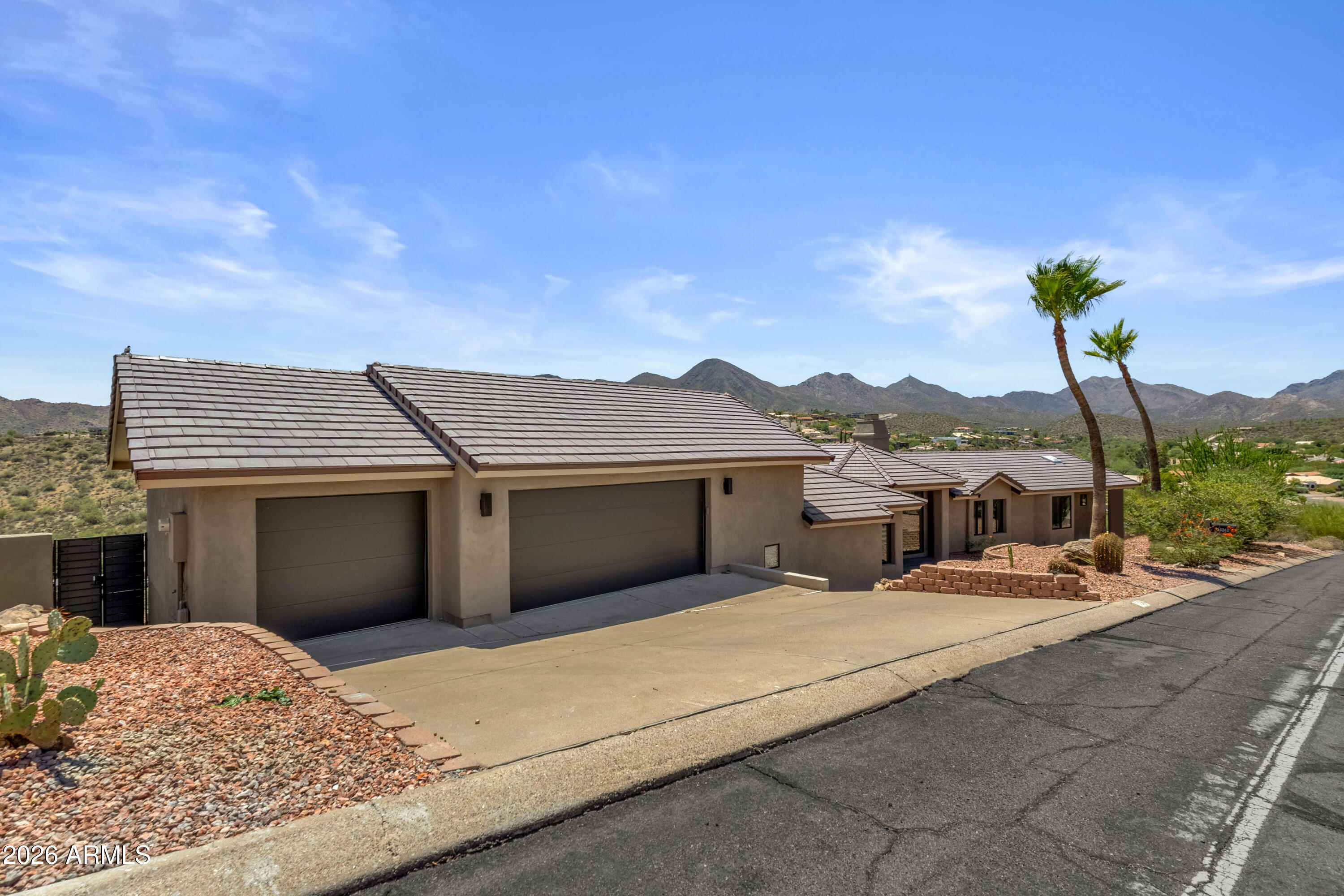 Perfectly positioned to maximize the breathtaking panoramic views and comfort, this stunning home is perched on an expansive 1.39acre lot. Ridiculously gorgeous sunrises and sunsets await you along with delightful city lights. Fully upgraded throughout, including a new roof, upgraded windows, touchless kitchen sink faucet, renovated bathrooms, flooring, etc, let this entertainers dream be yours today! Lives like a single story home with 4bed/2.5baths, 3 car garage and a whole to of character with the wood burning fireplace and wet bar in the main living room area. Head out to enjoy the pool downstairs complete with fenced in equipment. Here, you'll also find additional storage and the guest quarters with its own full bathroom and entry from the side gate. Don't let this one slip away!