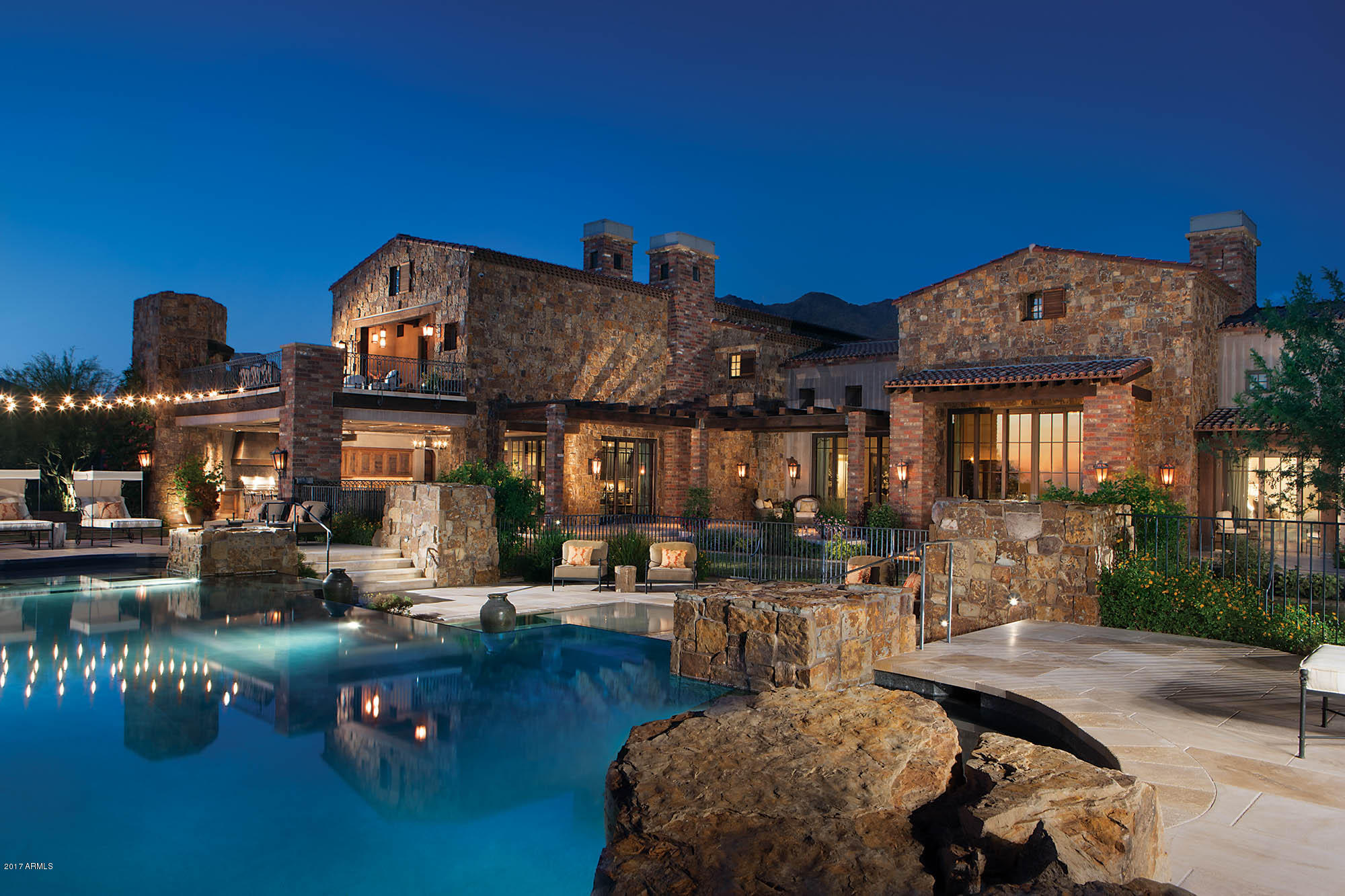 Spectacular mountain and city light views come with this luxurious estate situated on 4 private acres on the 6th hole of the Tom Weiscopf designed Silverleaf golf course and adjacent to the McDowell Mountain preserve’s hiking trails. All the main living areas including the Master suite are located on the first level. The home boasts 5 indoor and outdoor kitchens, 2 elevators, a virtual reality/golf simulator room, gymnasium w/ basketball court, volleyball court and rock climbing wall, home theater, fitness center w/steam room, detached guest house w/ private drive, 8 garages, high-tech game room, estate pool, multiple spas, state of the art security & home automation. Shown by appointment only. Buyer to pay the DC Ranch Community Transfer Fee of 0.5% of the sale price.
