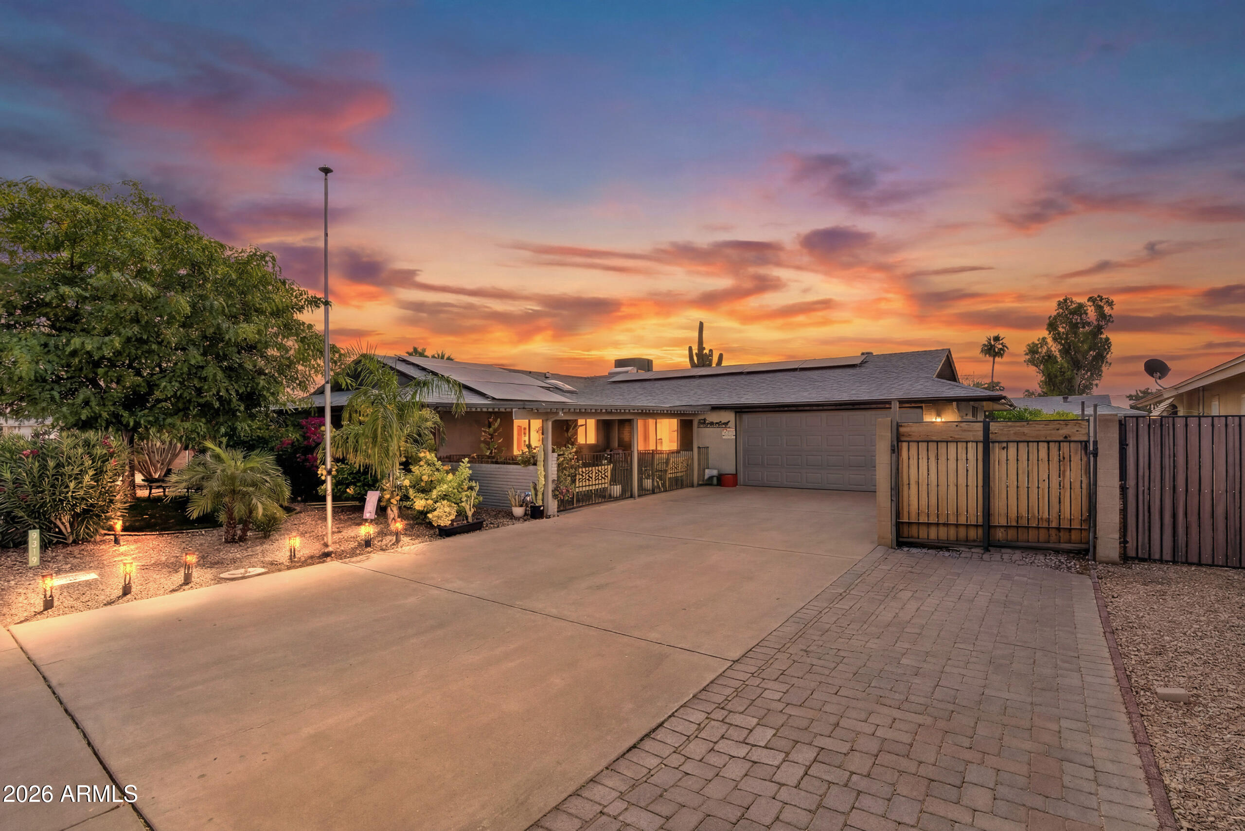 Welcome to Sun City! This inviting home offers roomy living spaces designed for function and comfort. The living and dining areas create a warm and welcoming atmosphere with an easy flow throughout the home. The kitchen features white cabinets, generous counter space, and additional storage and prep areas, creating a comfortable setting for everyday cooking and gathering. The primary bedroom includes a walk-in closet and a walk-in shower in the bathroom, while the additional bedroom and bathroom offer flexible space for guests or a home office. A spacious garage adds convenience and a functional space. Outside, enjoy a landscaped backyard with artificial turf, relaxing fountain, and the large covered patio with outdoor kitchen, perfect for entertaining or relaxing with family and friends.