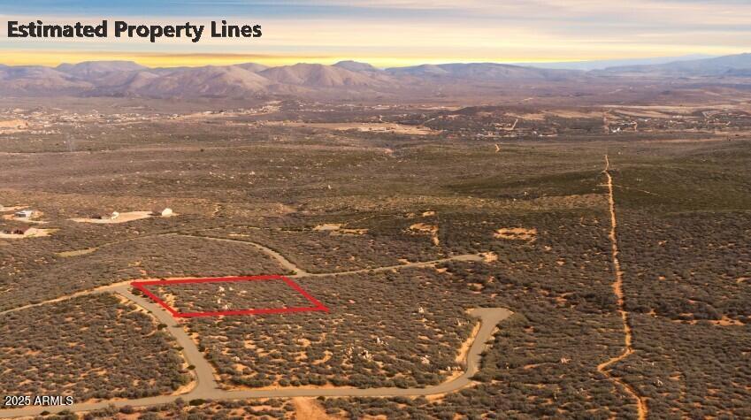 2.03 Acres in Beautiful Estate of Cherry Ridge in Dewey, Az. With asphalt running all the way to the property line and views that don't stop in every direction. Beautiful Site Built homes already established in the area. The feeling of being rural but still moments from all amenities in each direction. Survey on file if you are looking for a larger lot, it has not been recorded yet. Buy all 11.46 Acres together or split with easy access and no easements needed! You have to see this property to really appreciate what it has to offer.