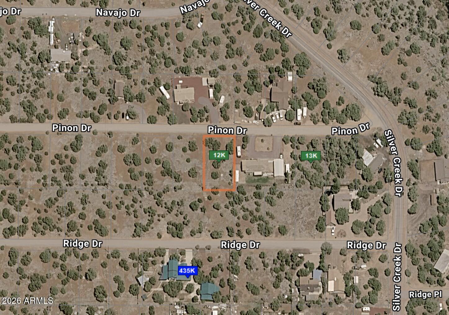 R1-10 zoned residential lot located at 8455 Pinon Dr in Show Low (0.25 acres) in a quiet mountain community setting. Ideal for a custom home or long-term investment. Buyer to verify zoning, utilities, access, and building requirements with Navajo County.